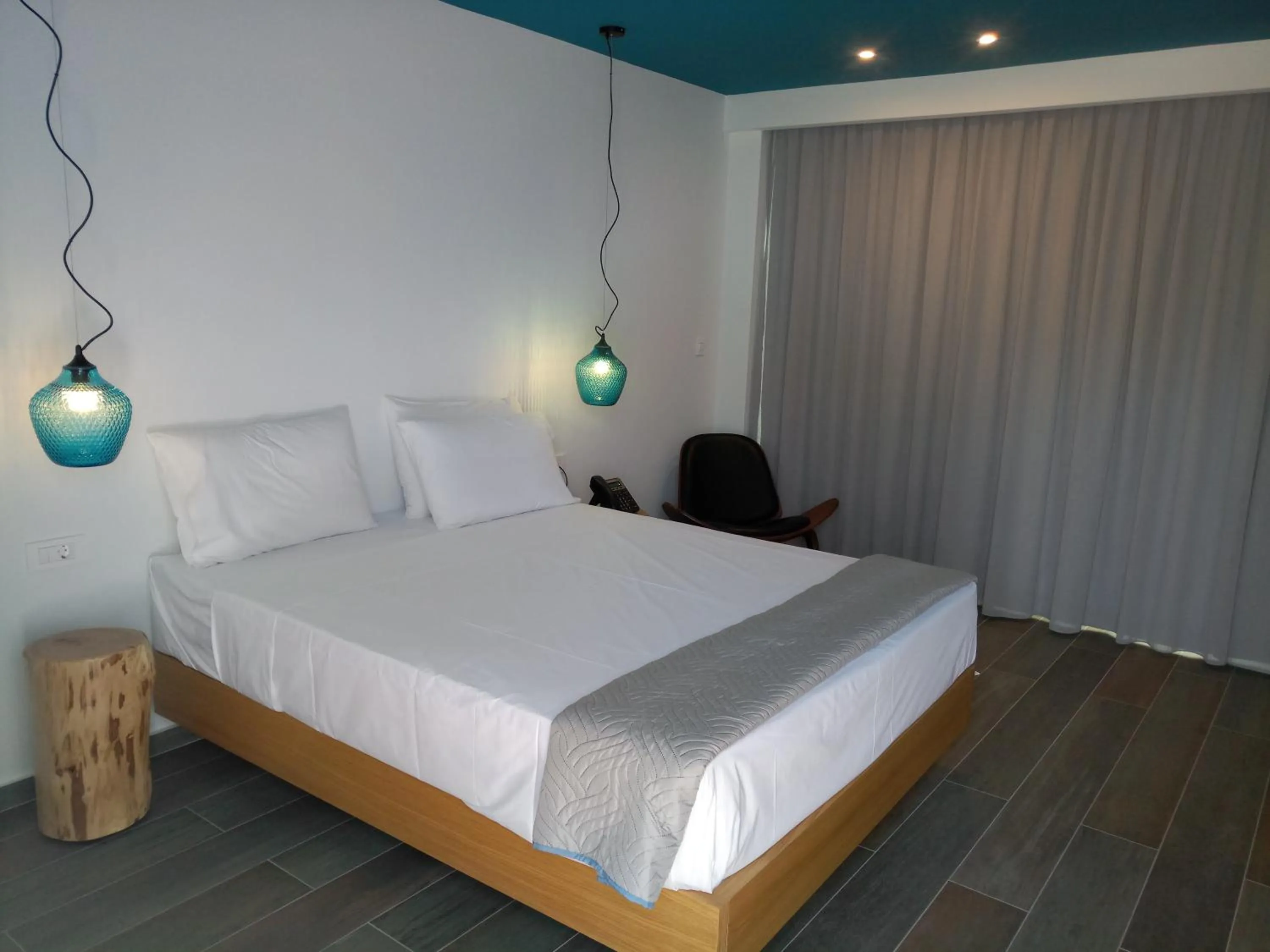 Bed in Meropi Hotel & Apartments