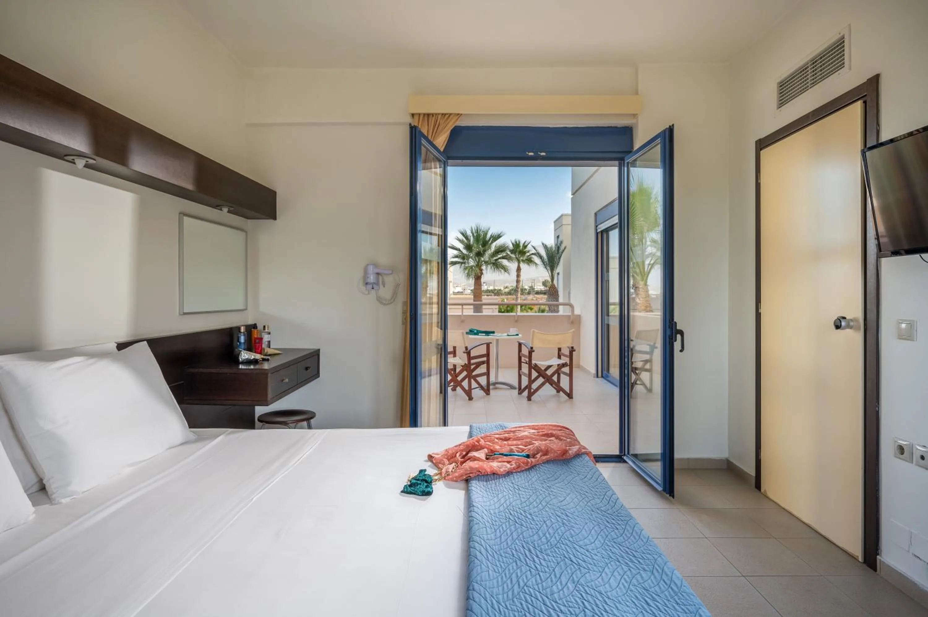 Bed in Meropi Hotel & Apartments