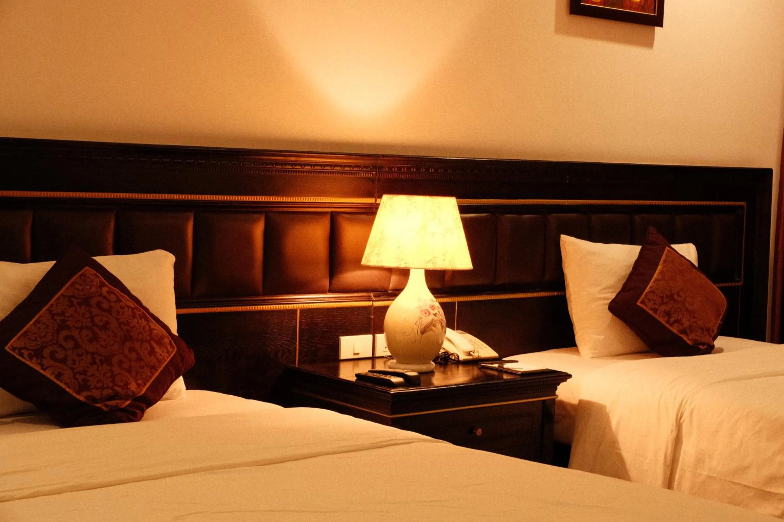 Bed in The Vissai Hotel