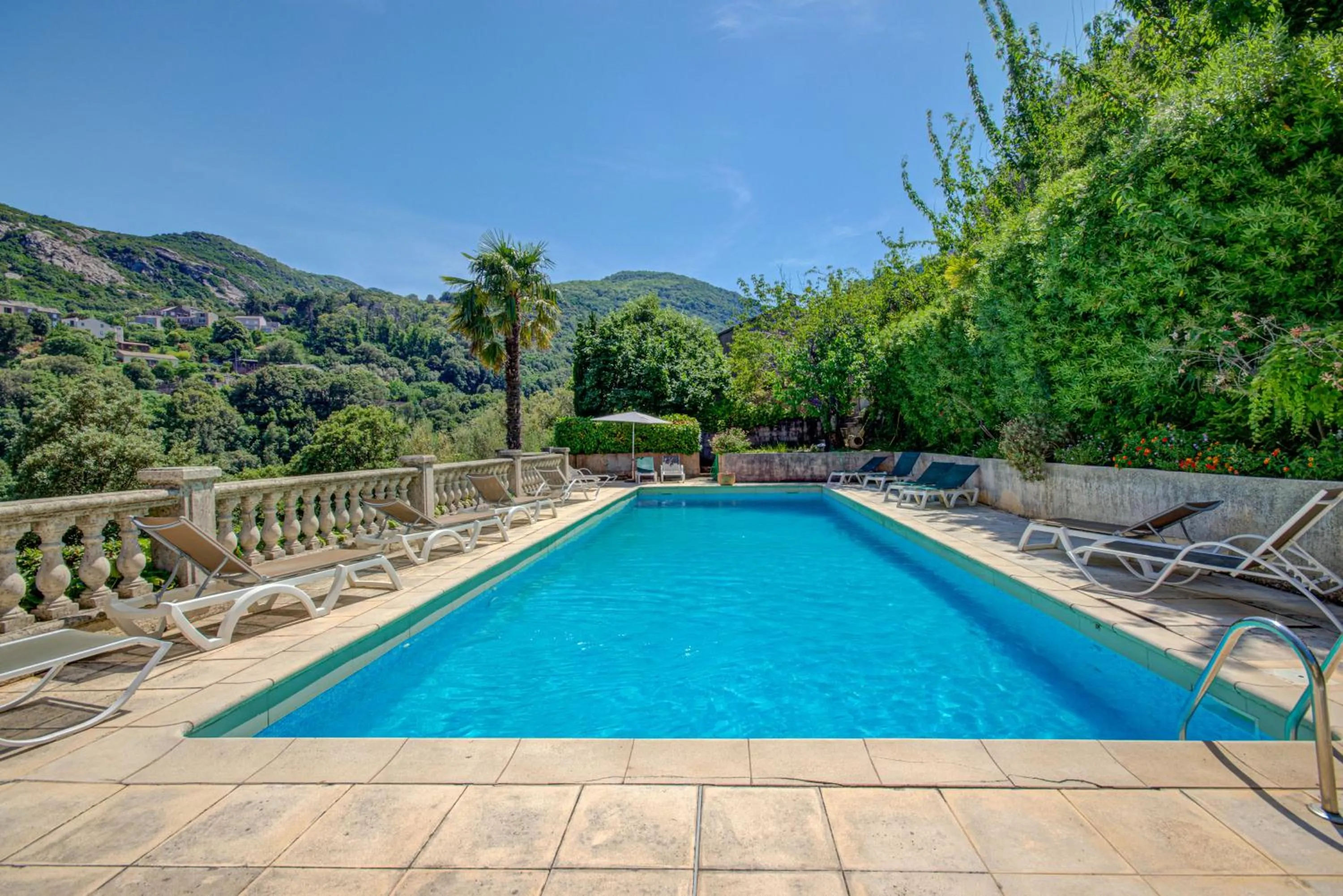 Swimming pool in Hôtel Restaurant la Corniche