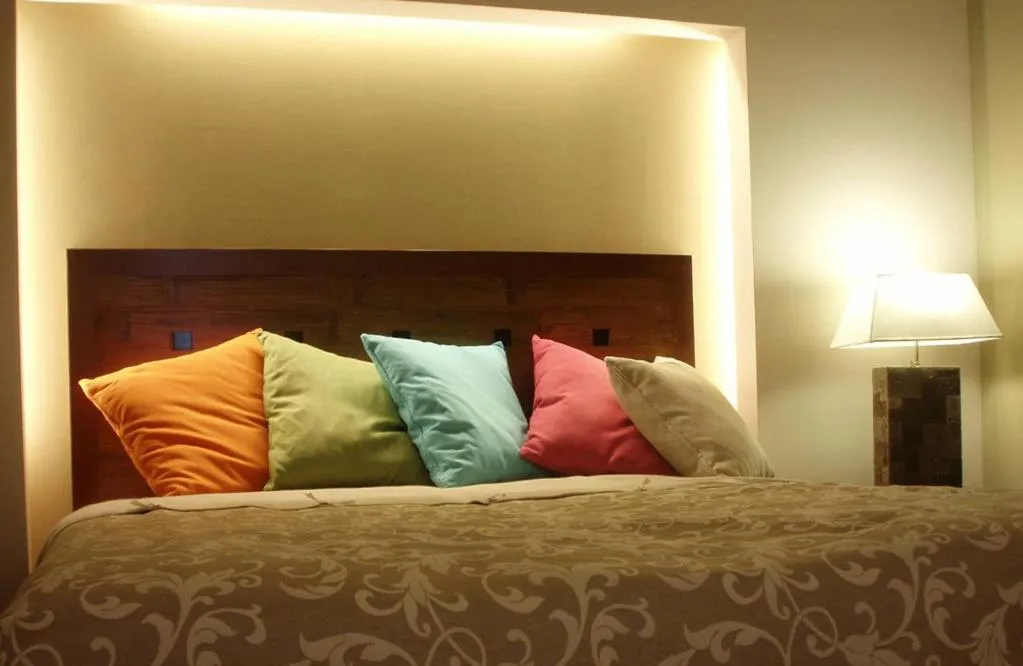 Bed in Astrolabe Hotel