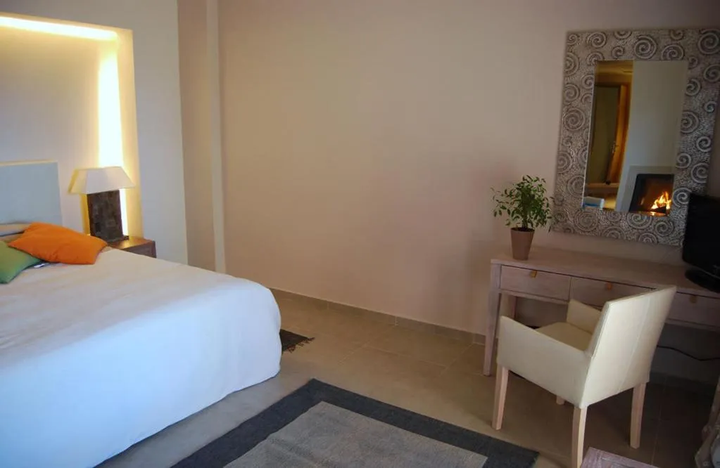 Bed in Astrolabe Hotel