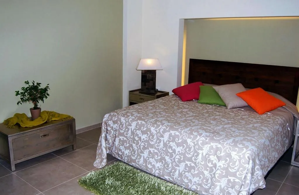 Bed in Astrolabe Hotel