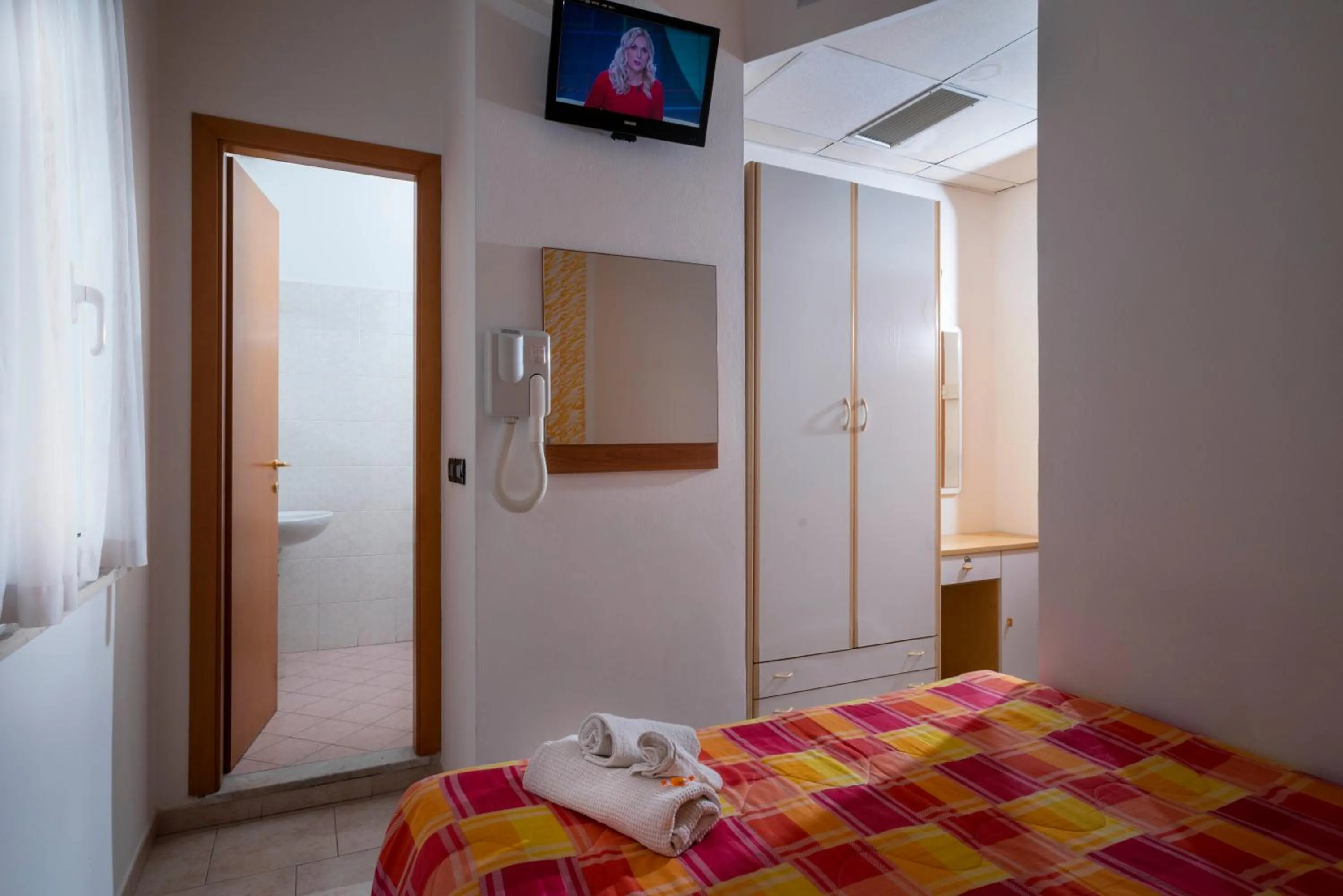 Bed in Hotel Petrarca