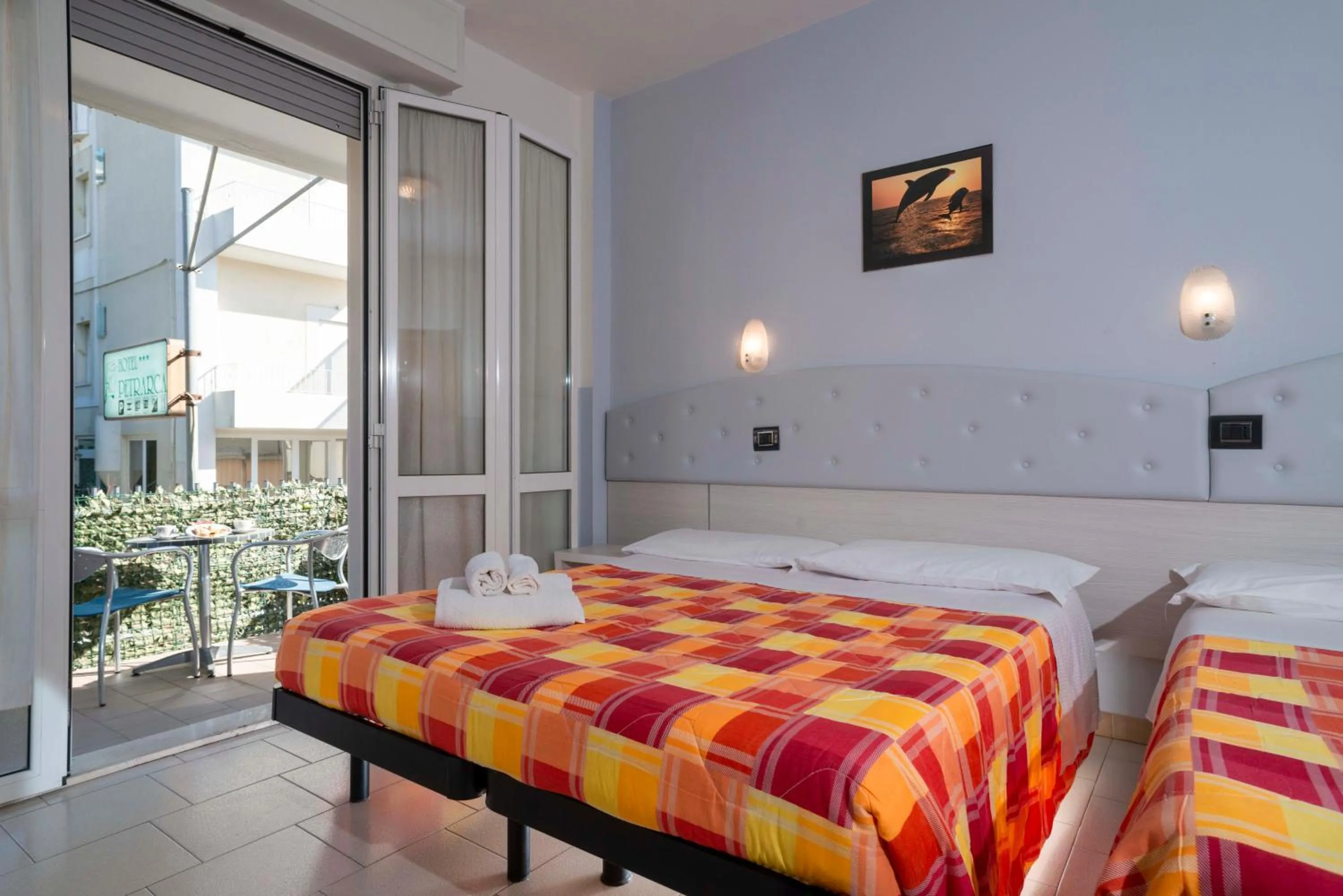 Bed in Hotel Petrarca