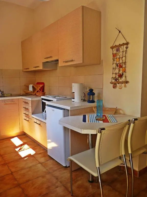 Kitchen or kitchenette in Feeloxenia Corfu Apartments