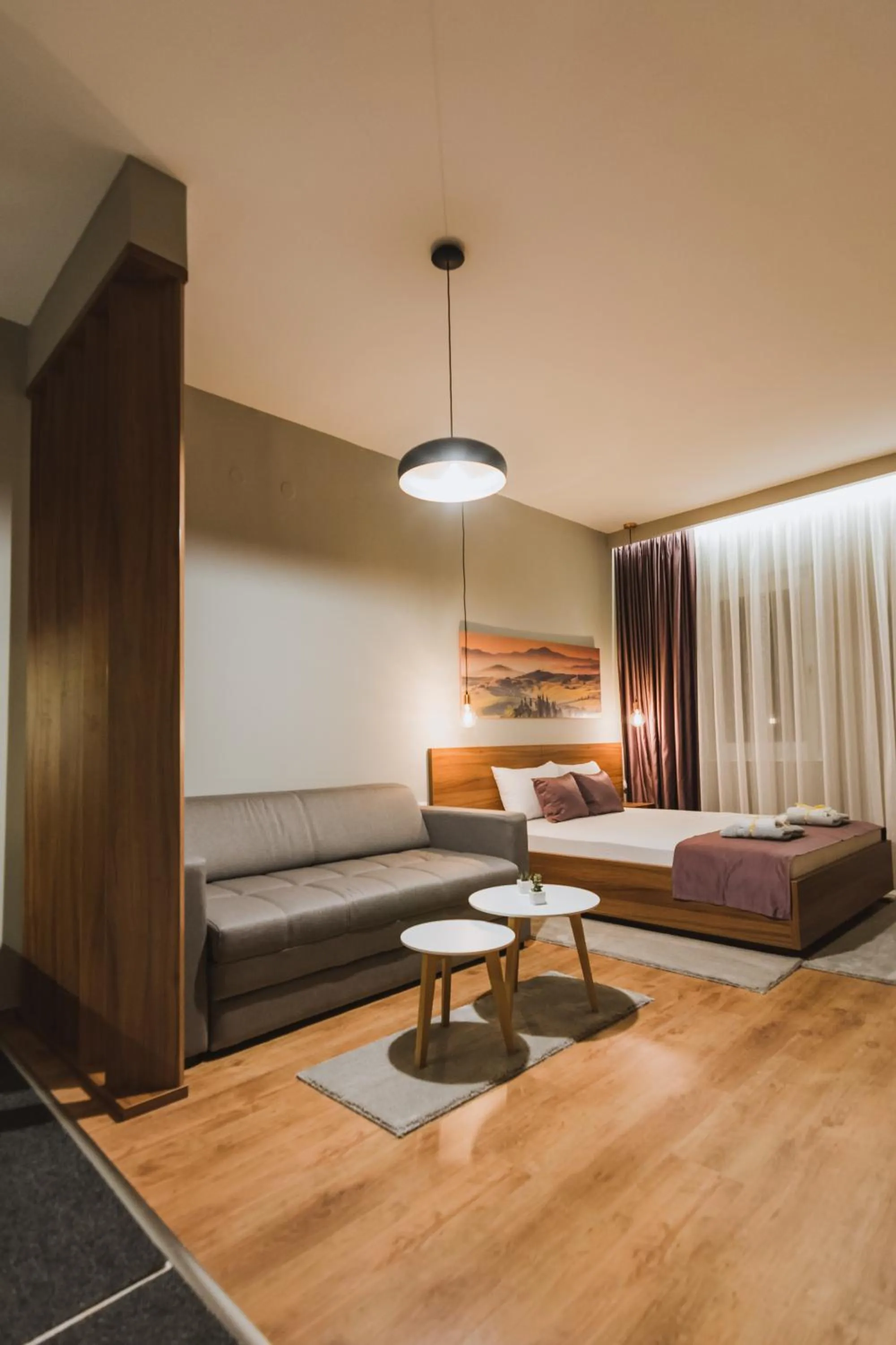 Bed in Central Plaza Apartments