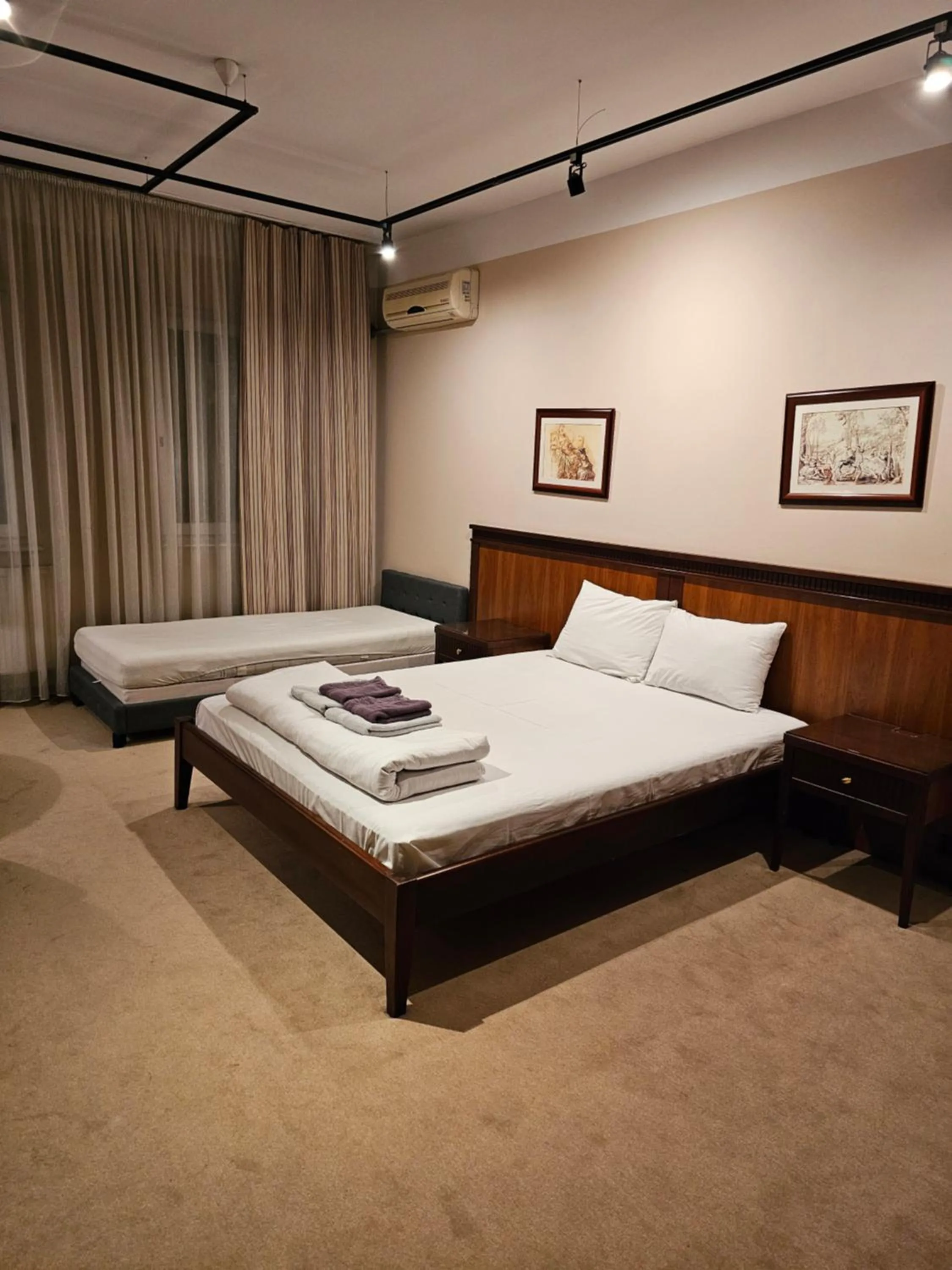Bed in Central Plaza Apartments