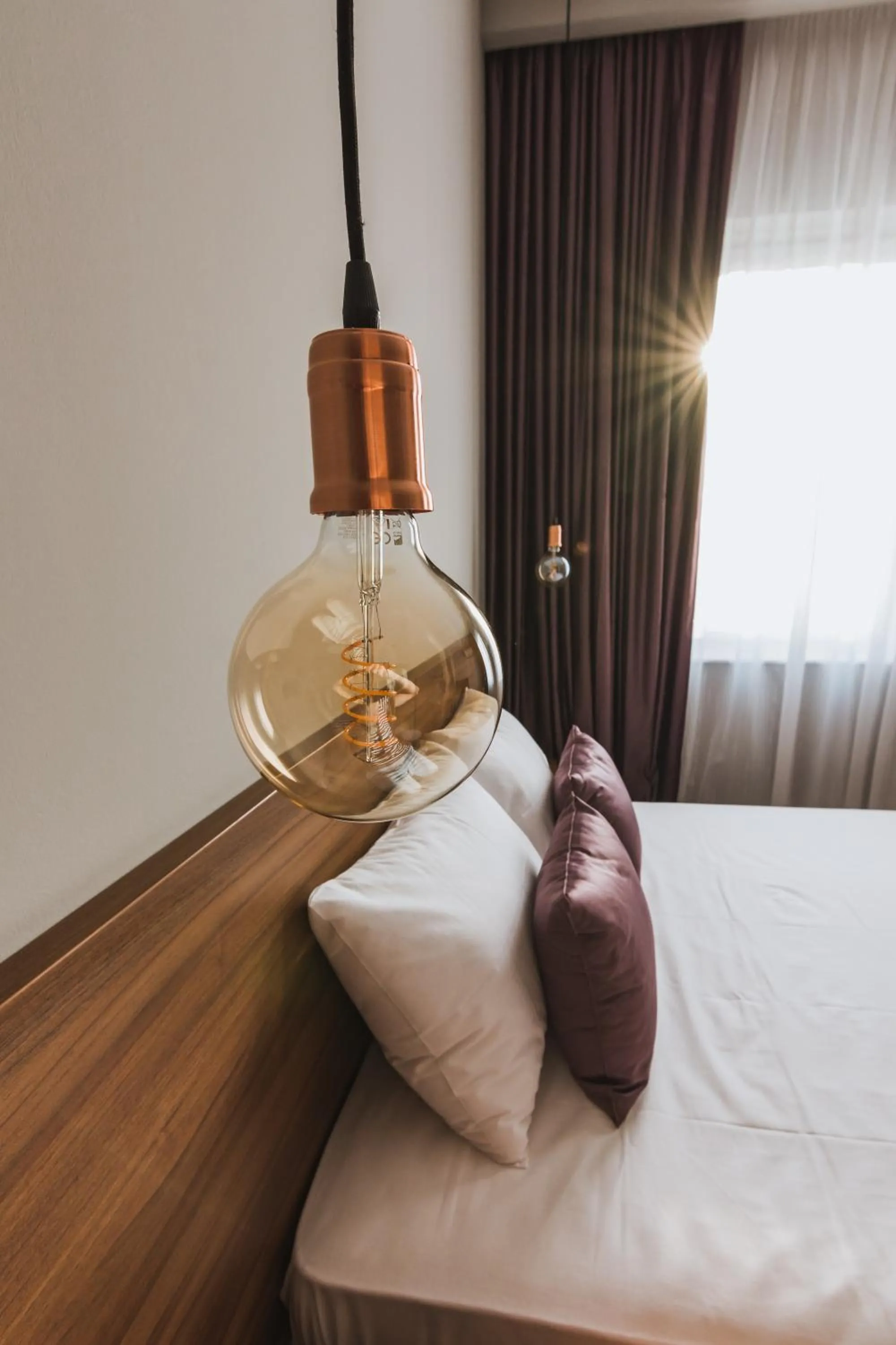 Bed in Central Plaza Apartments
