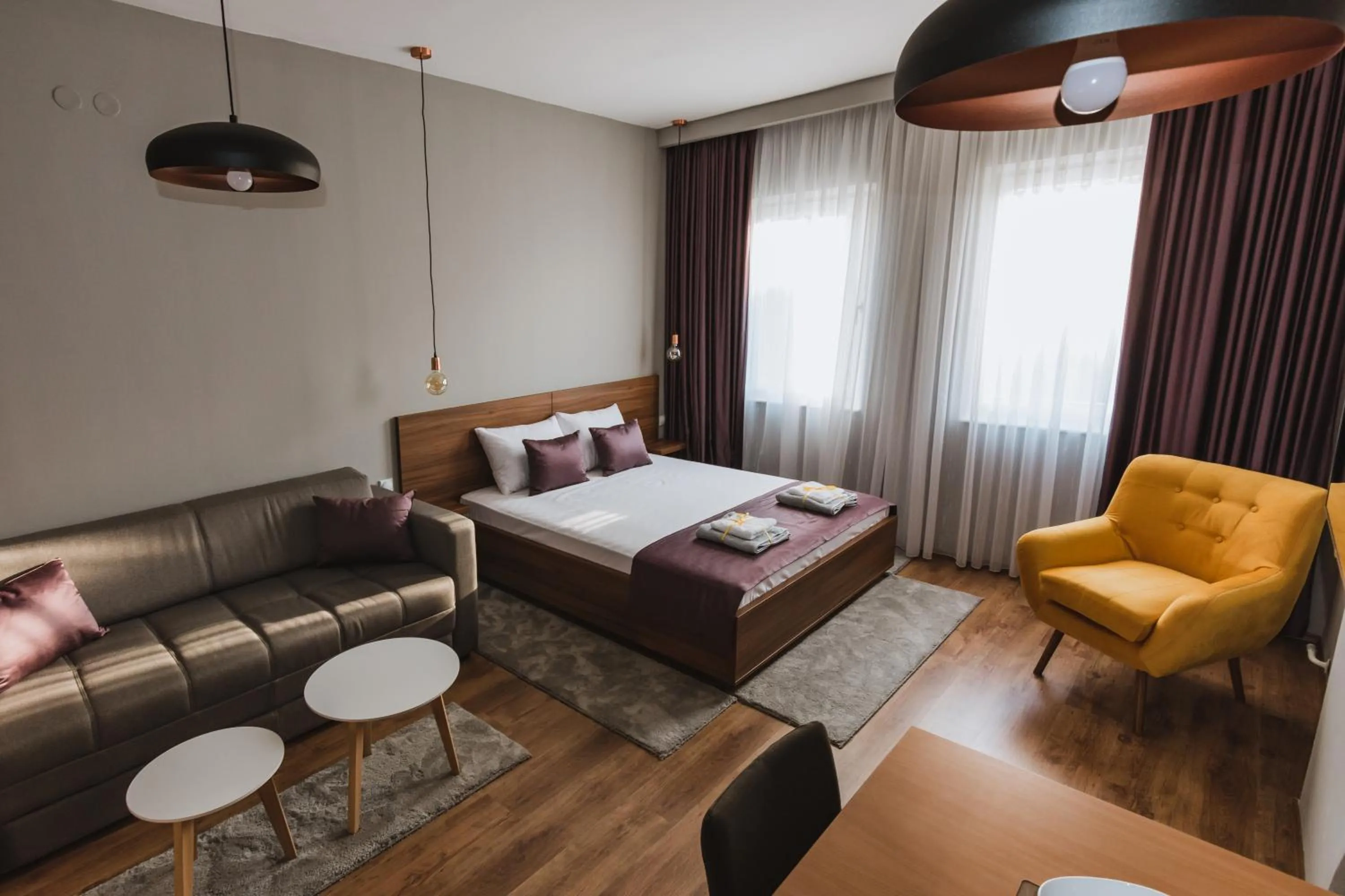 Bed in Central Plaza Apartments
