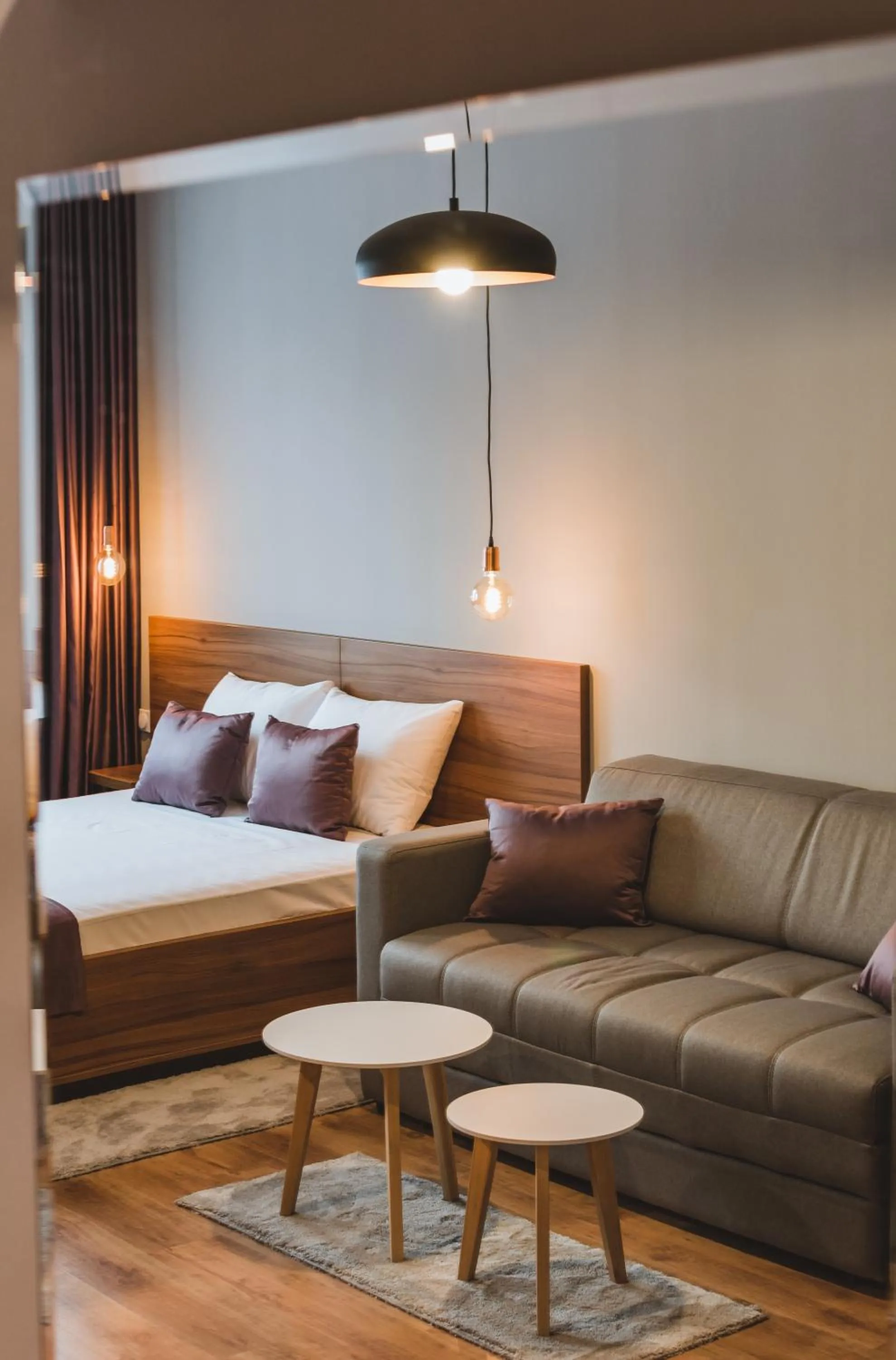 Bed in Central Plaza Apartments