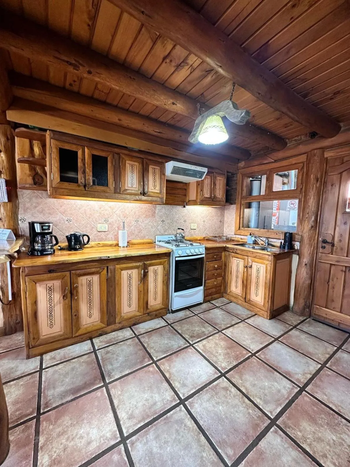 Kitchen or kitchenette in Cabañas Las Nubes