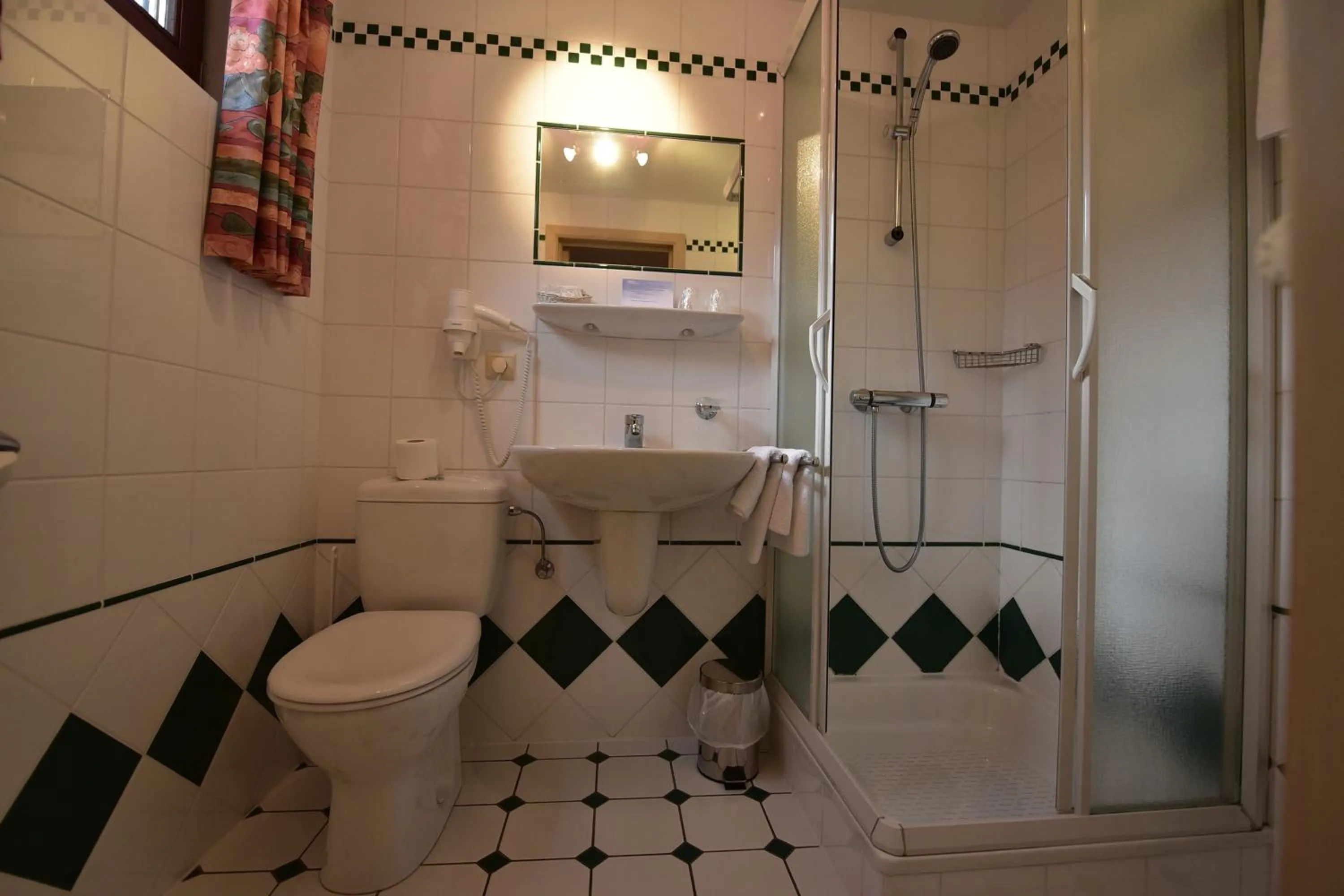 Bathroom in Hôtel Moulin de la Strument