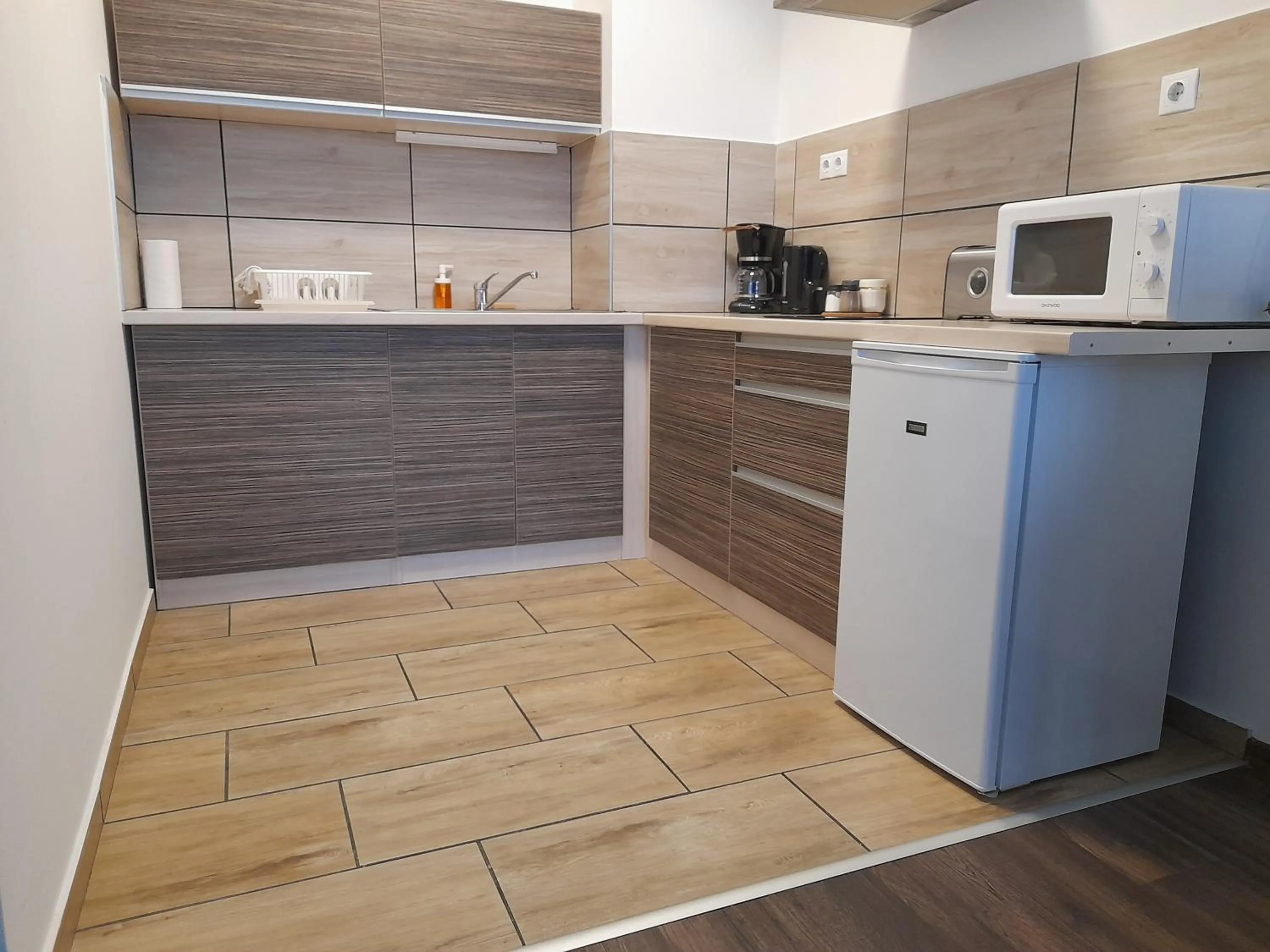 Kitchen or kitchenette in Corvin Residence Apartments