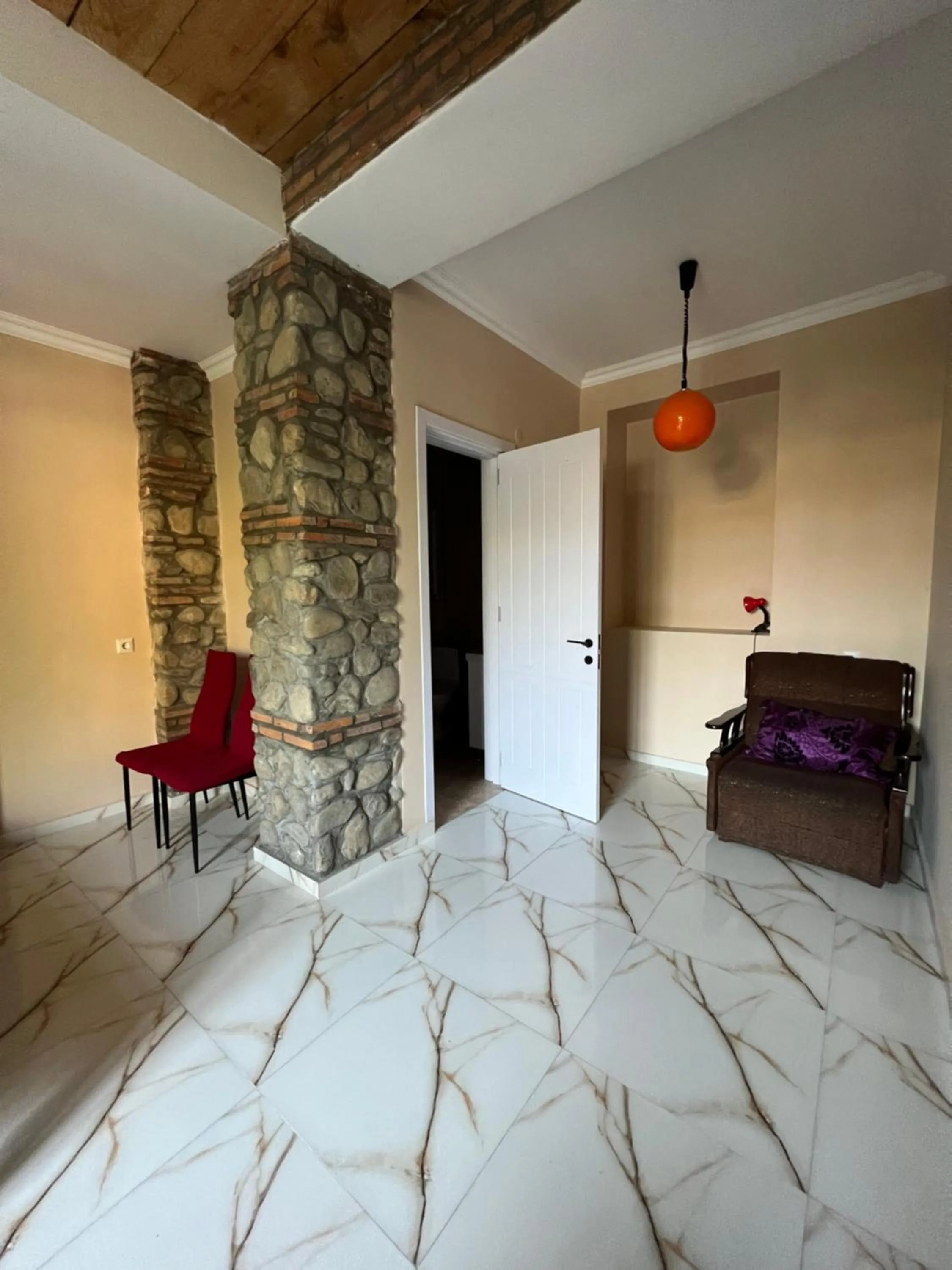 Seating area, Bed in Guest House Lali