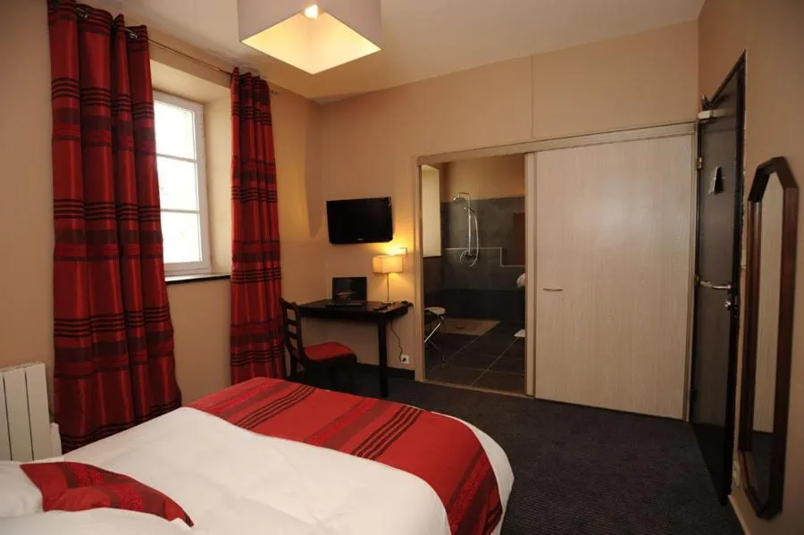 Photo of the whole room, Bed in Domaine du Griffier