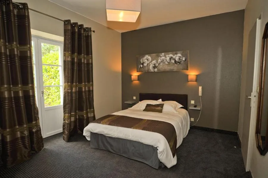 Photo of the whole room, Bed in Domaine du Griffier