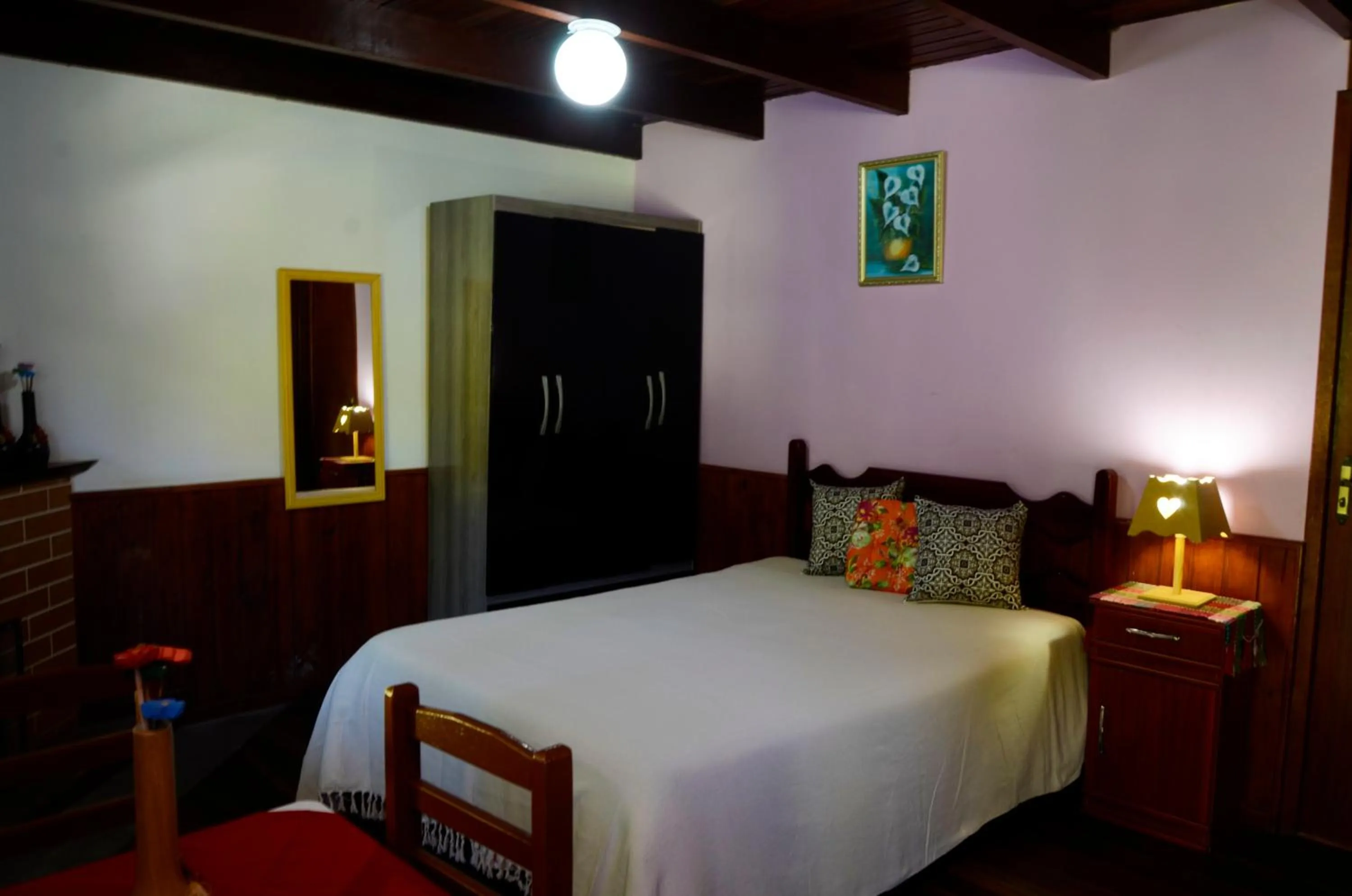 Bed in Pousada Sabor da Serra