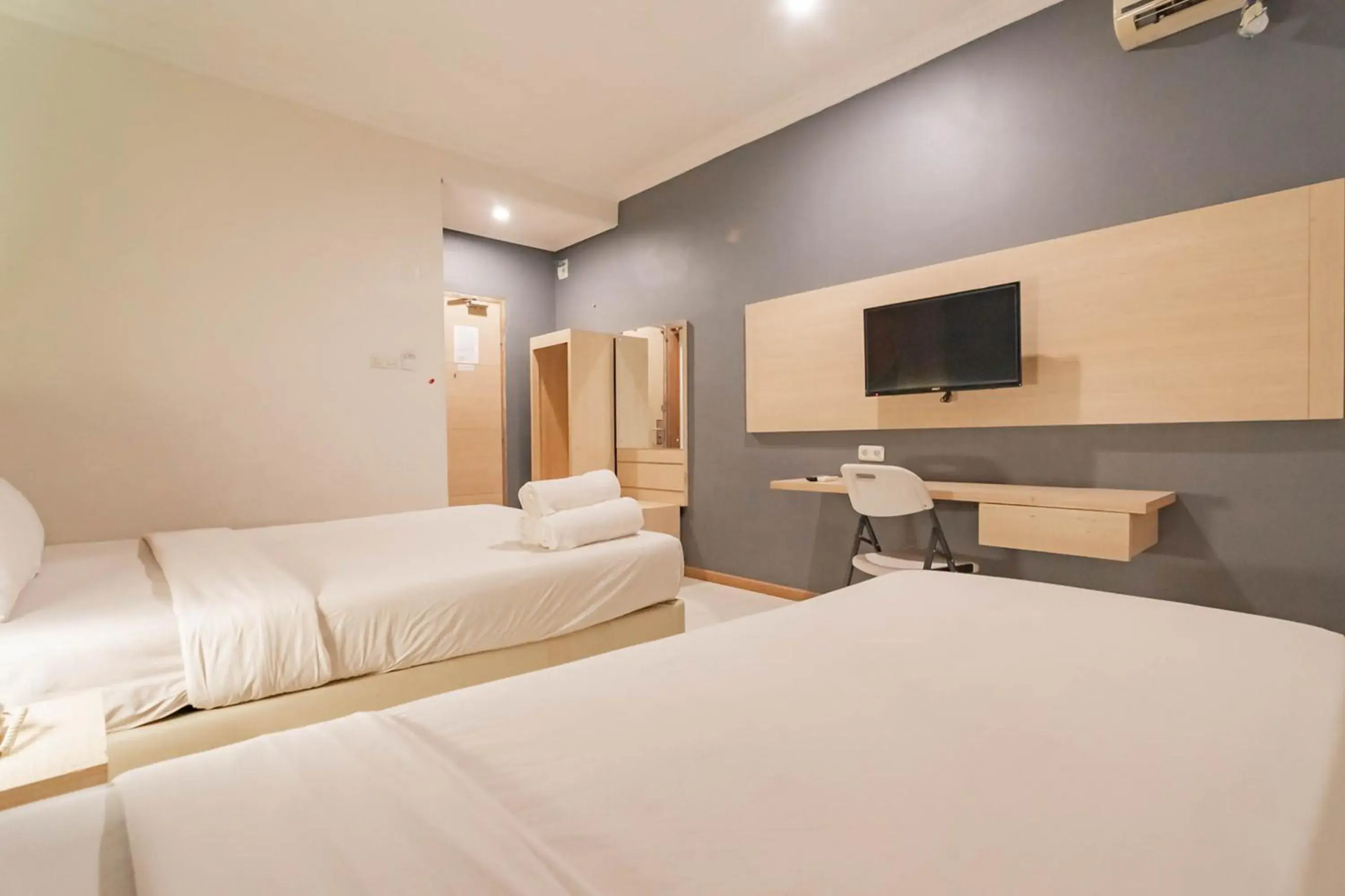 Bed in RedDoorz At Hotel Arimbi Dewi Sartika Baru Bed in RedDoorz At Hotel Arimbi Dewi Sartika Baru