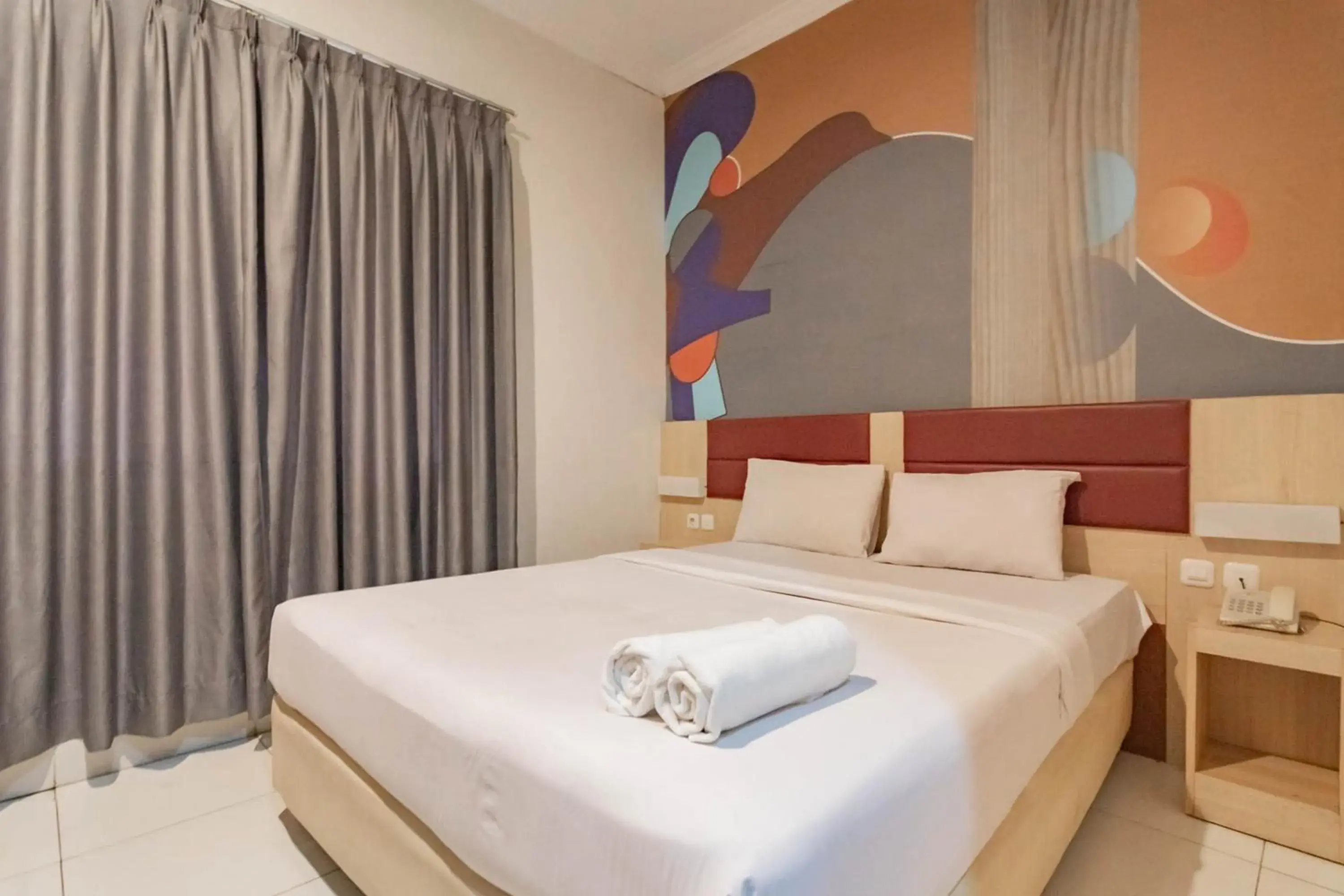 Bed in RedDoorz At Hotel Arimbi Dewi Sartika Baru Bed in RedDoorz At Hotel Arimbi Dewi Sartika Baru