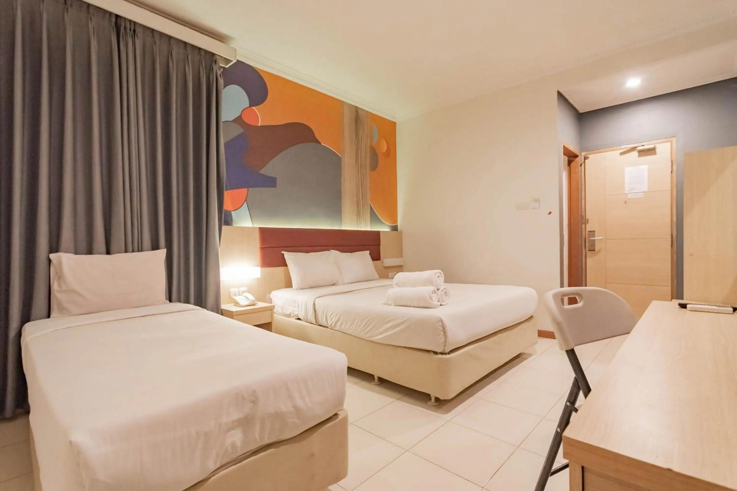 Bed in RedDoorz At Hotel Arimbi Dewi Sartika Baru