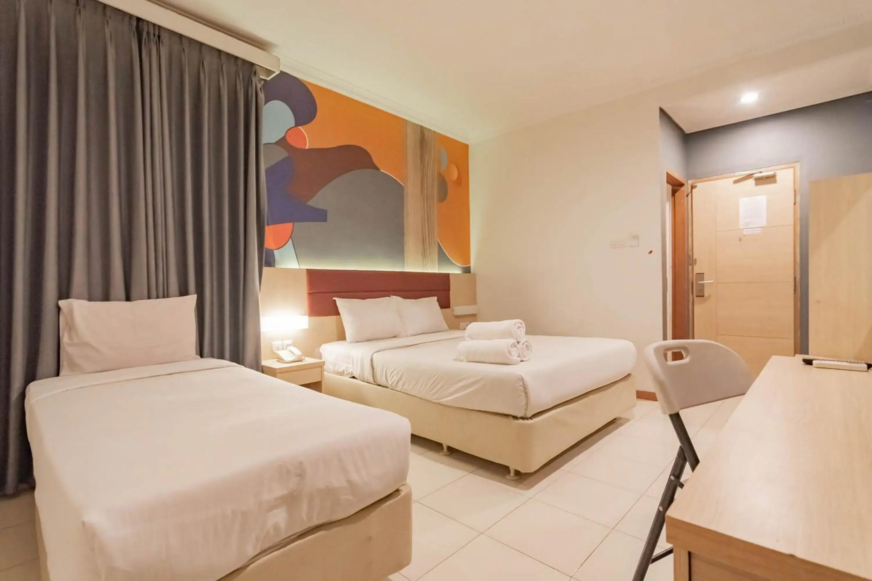 Bed in RedDoorz At Hotel Arimbi Dewi Sartika Baru Bed in RedDoorz At Hotel Arimbi Dewi Sartika Baru