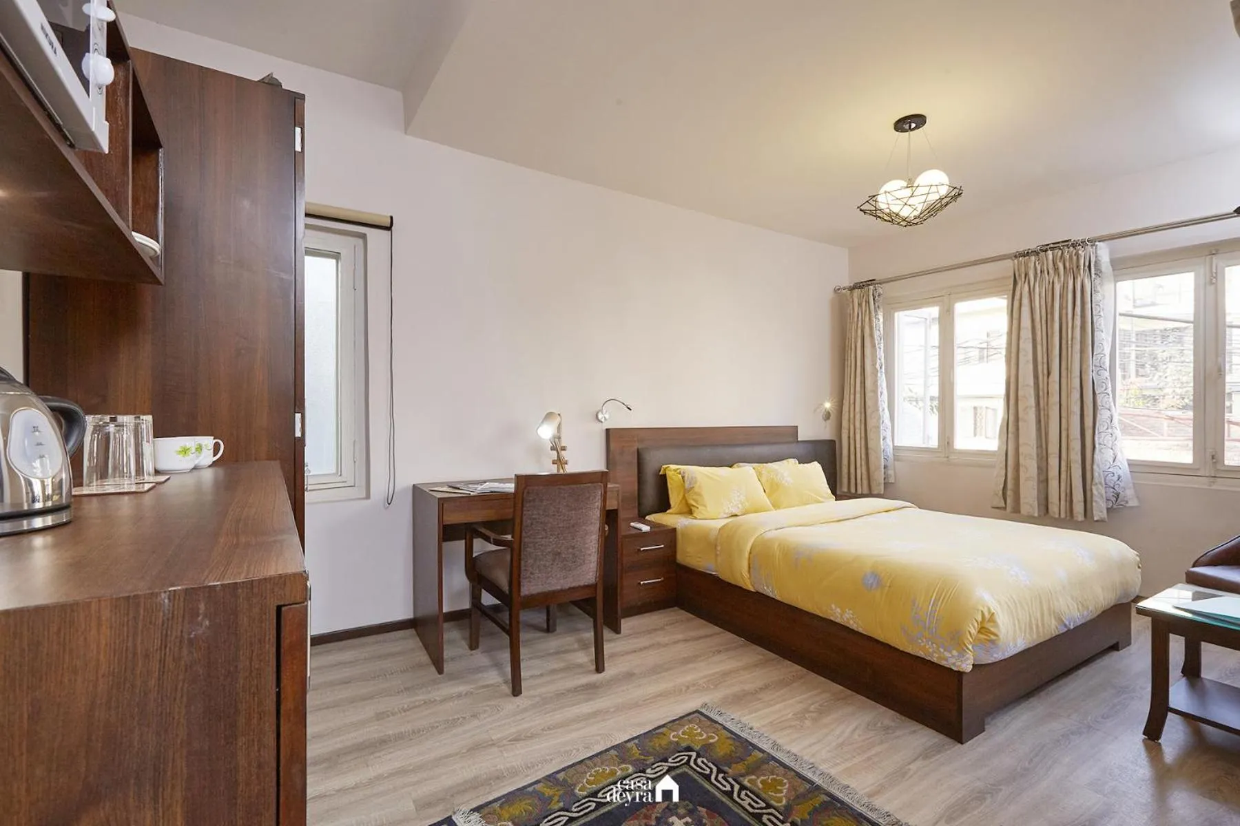 Kitchen or kitchenette, Bed in Ranikunj Boutique Hotel