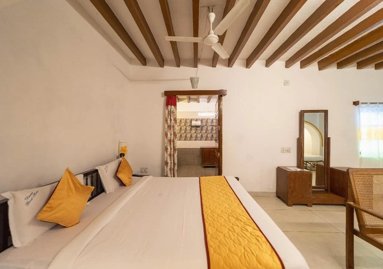 Bed in Dumas Guest House