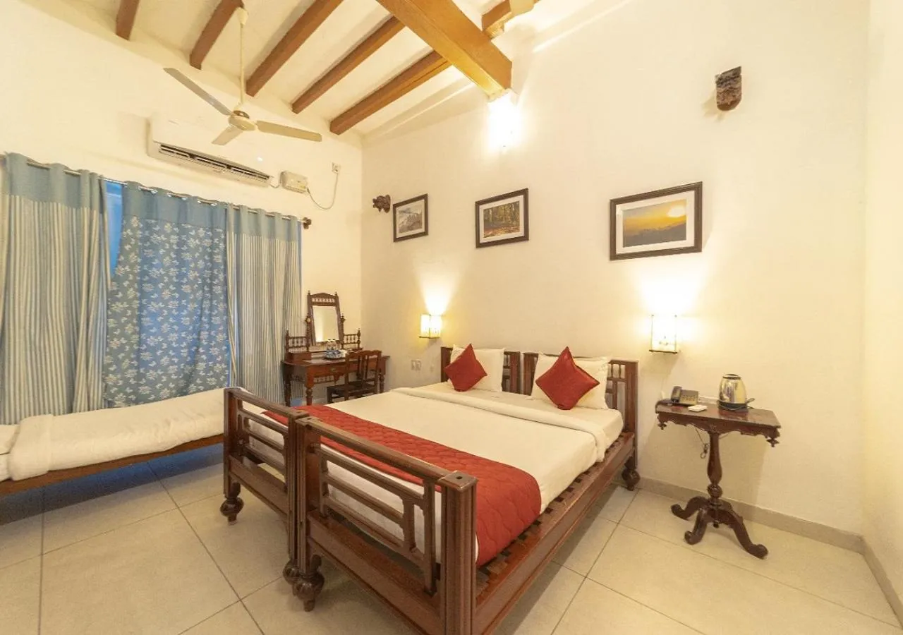 Bed in Dumas Guest House