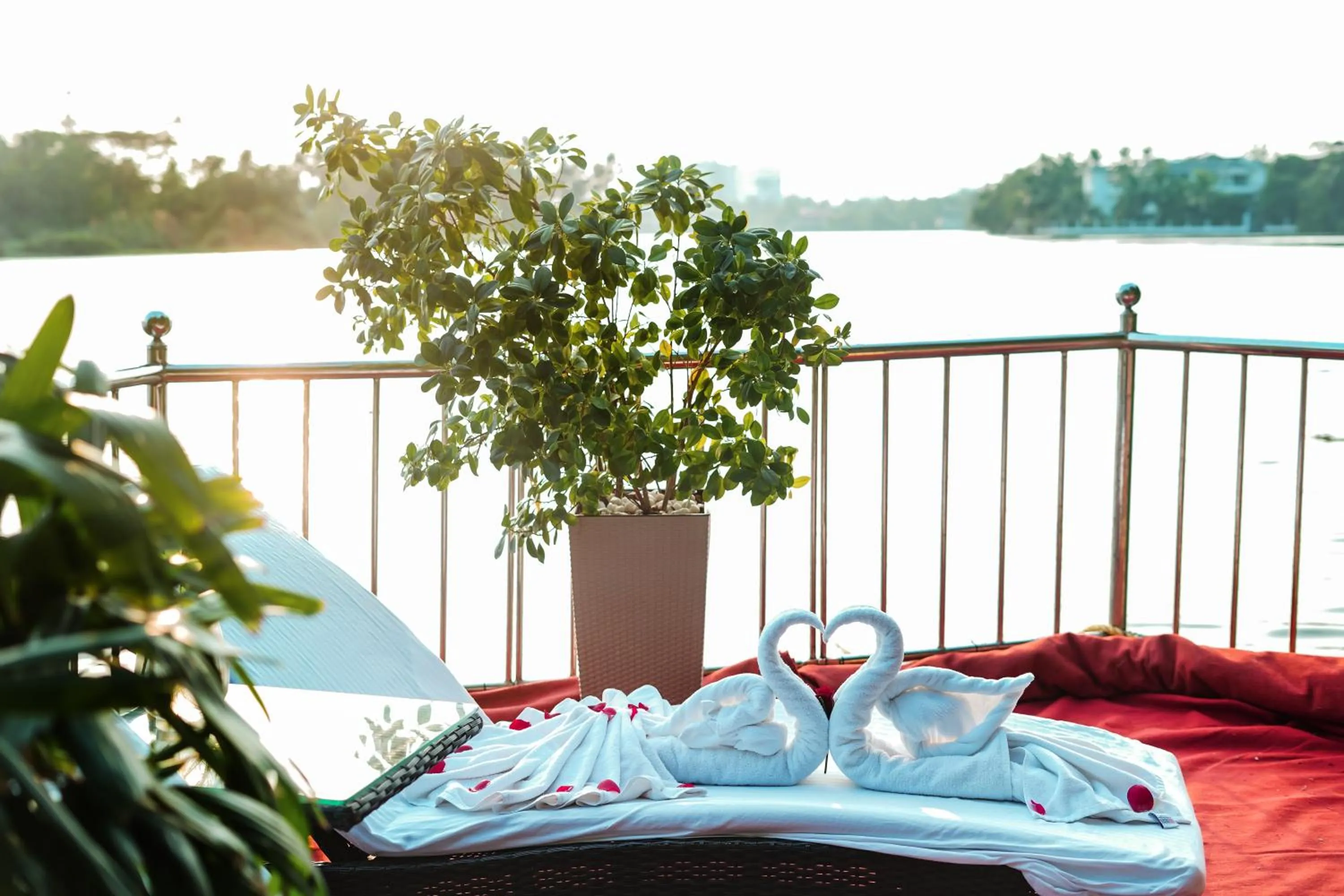 Lake view, Bed in JVK Park Hotel