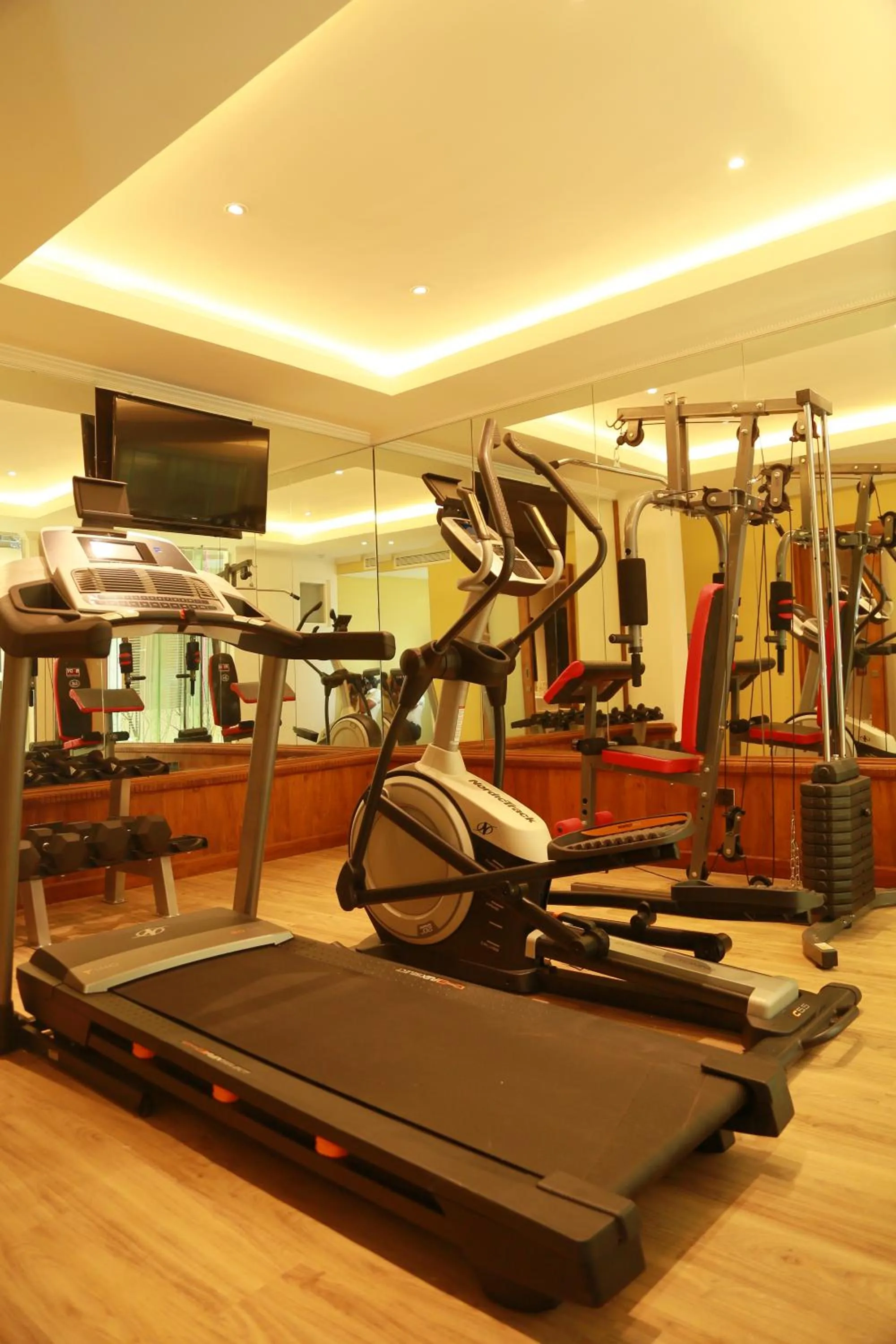Fitness centre/facilities in The Radh Hotel