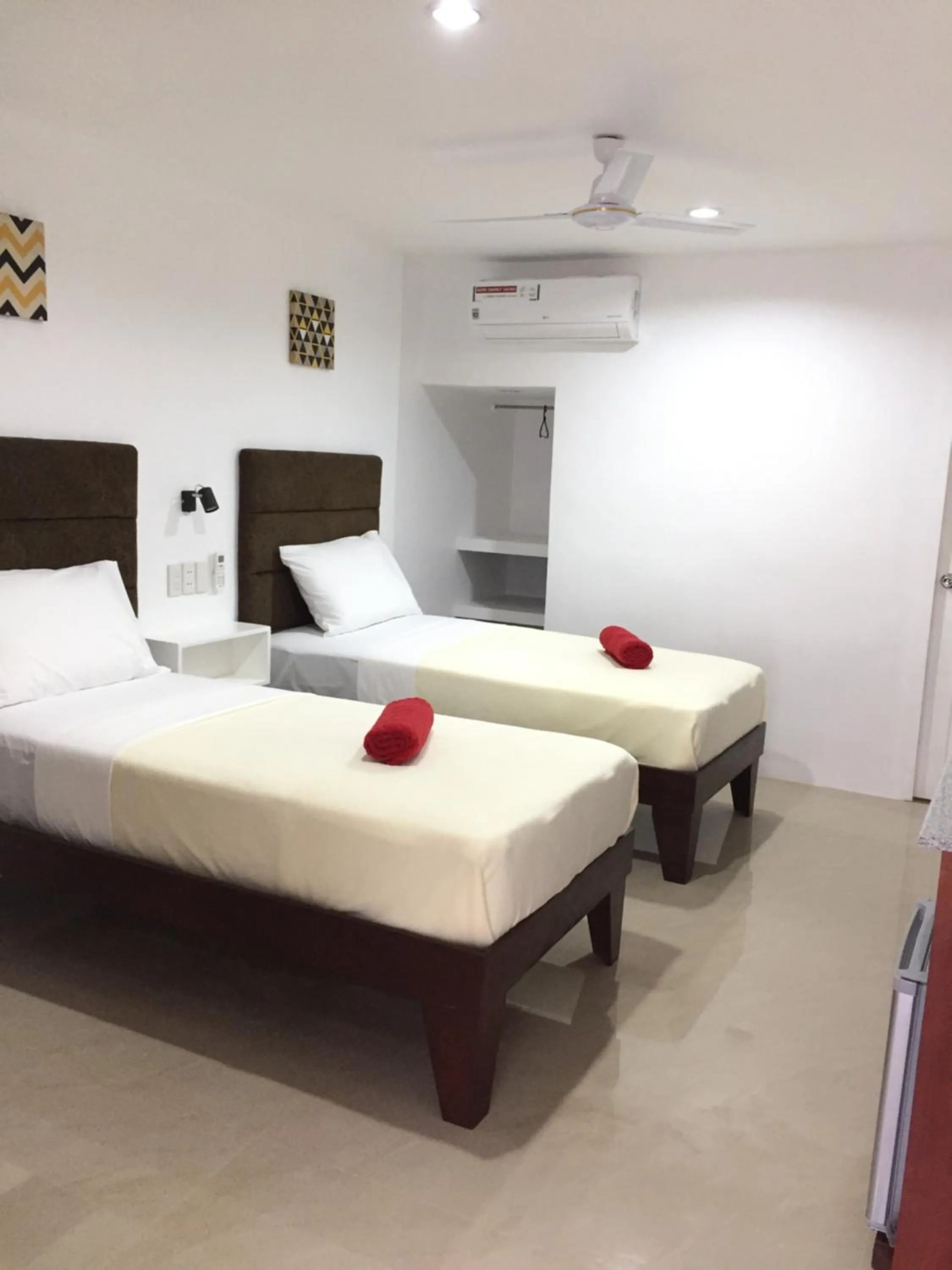 Bed in Heartland Hotel Serviced Rooms & Apartments.