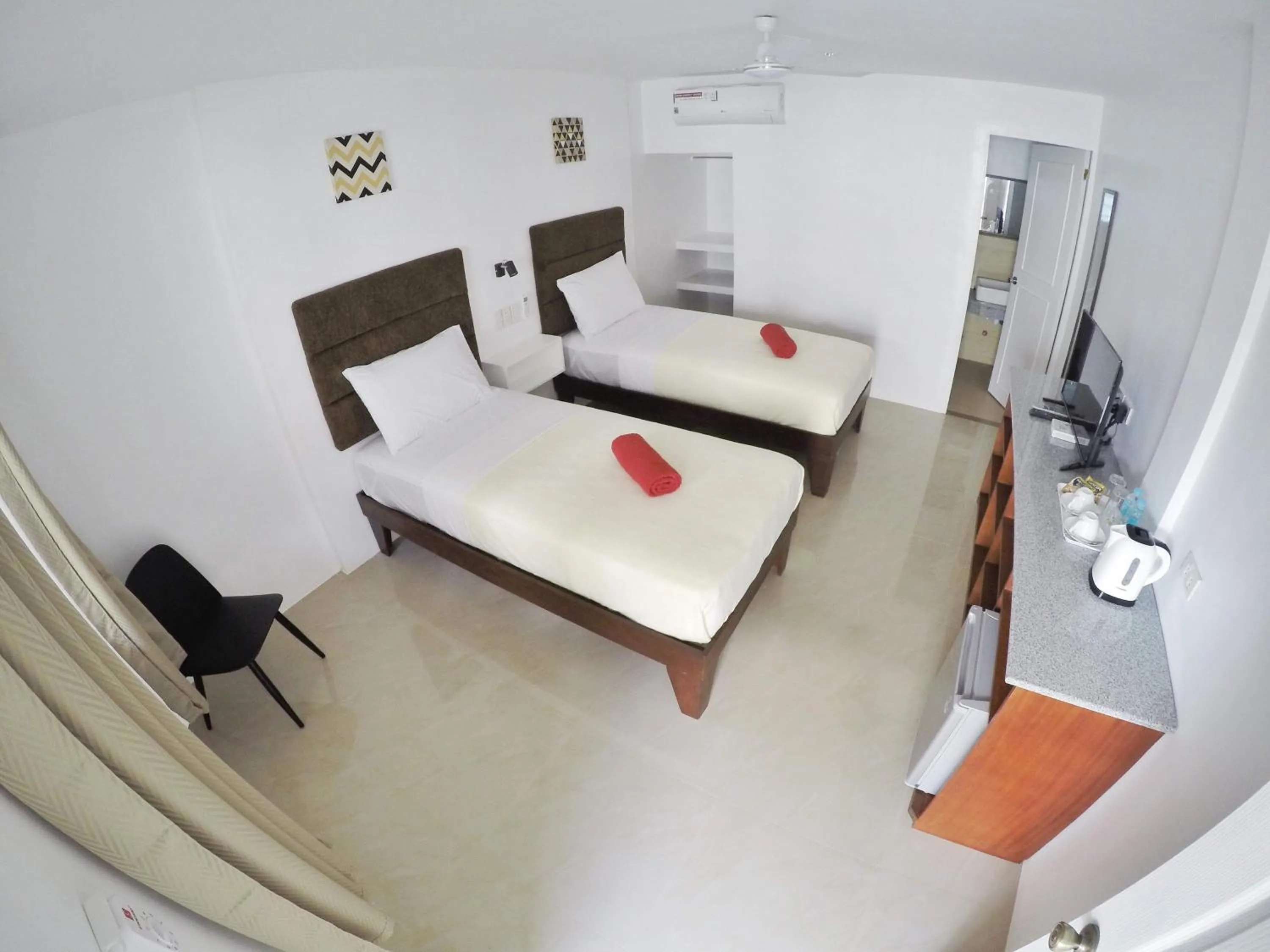 Bed in Heartland Hotel Serviced Rooms & Apartments.