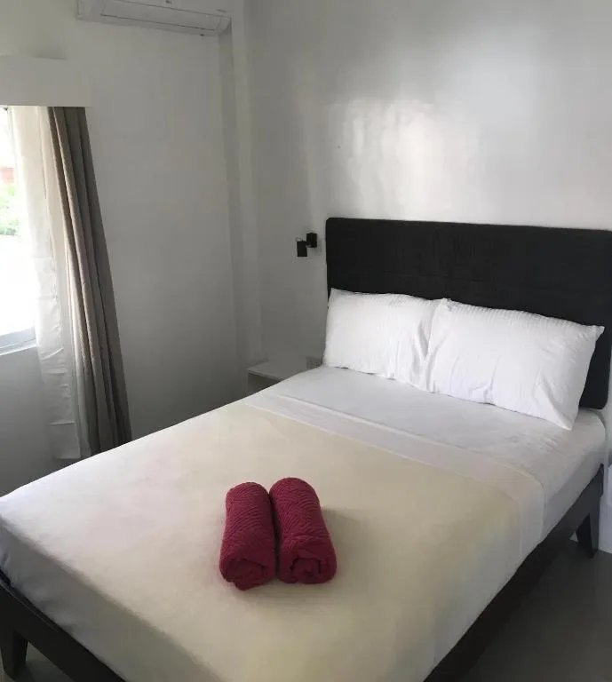 Bed in Heartland Hotel Serviced Rooms & Apartments.