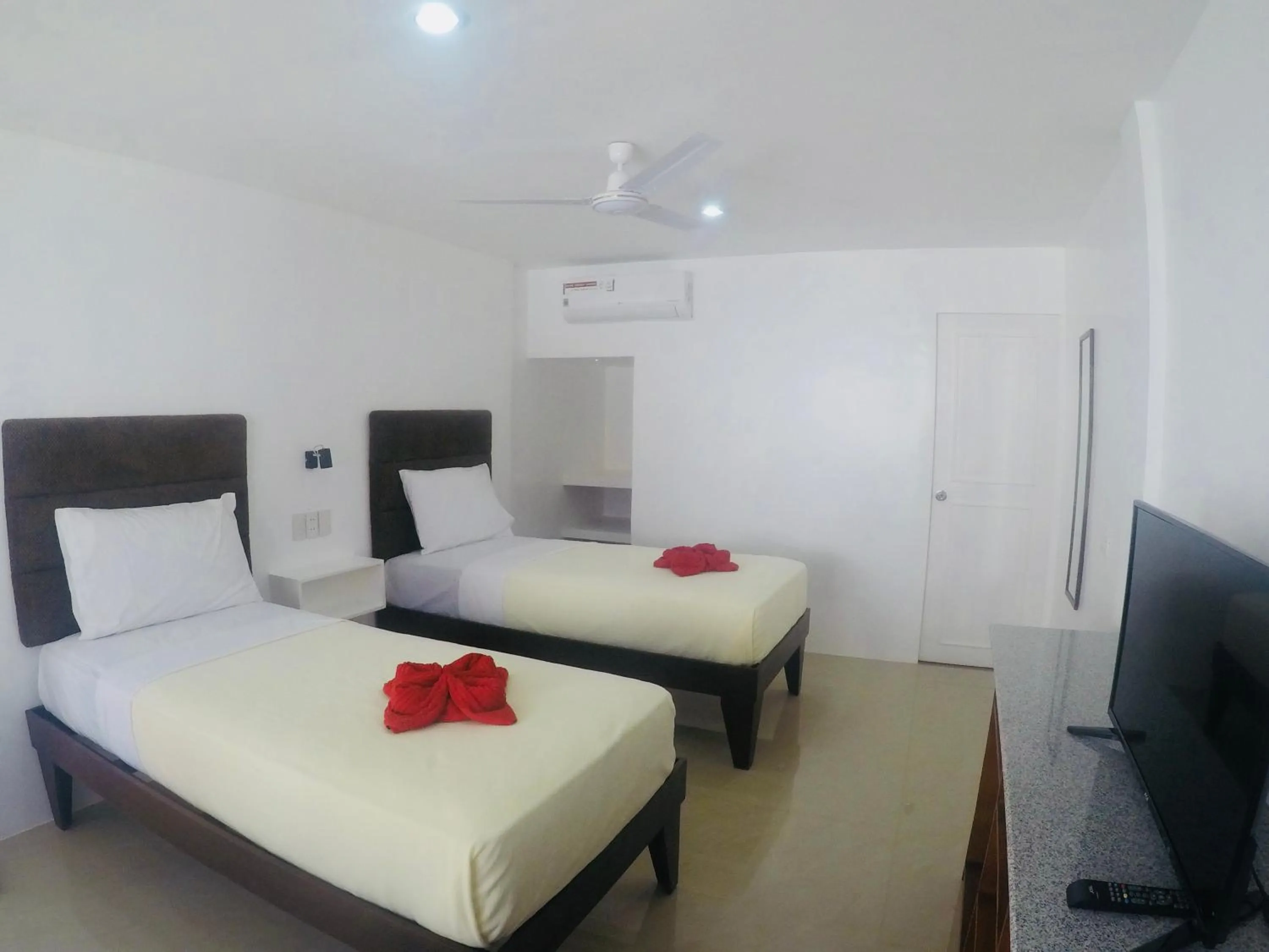 Bed in Heartland Hotel Serviced Rooms & Apartments.