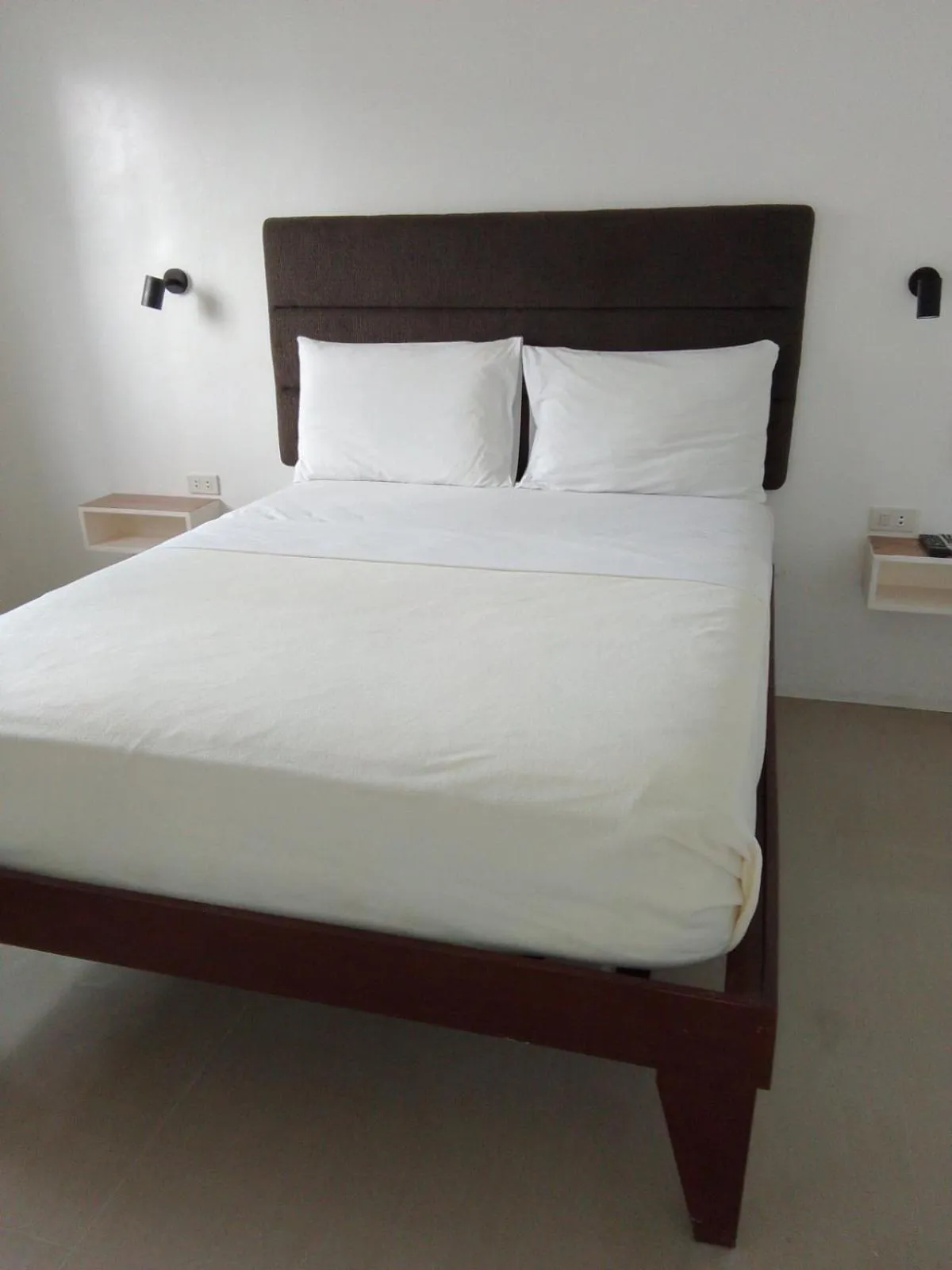 Bed in Heartland Hotel Serviced Rooms & Apartments.