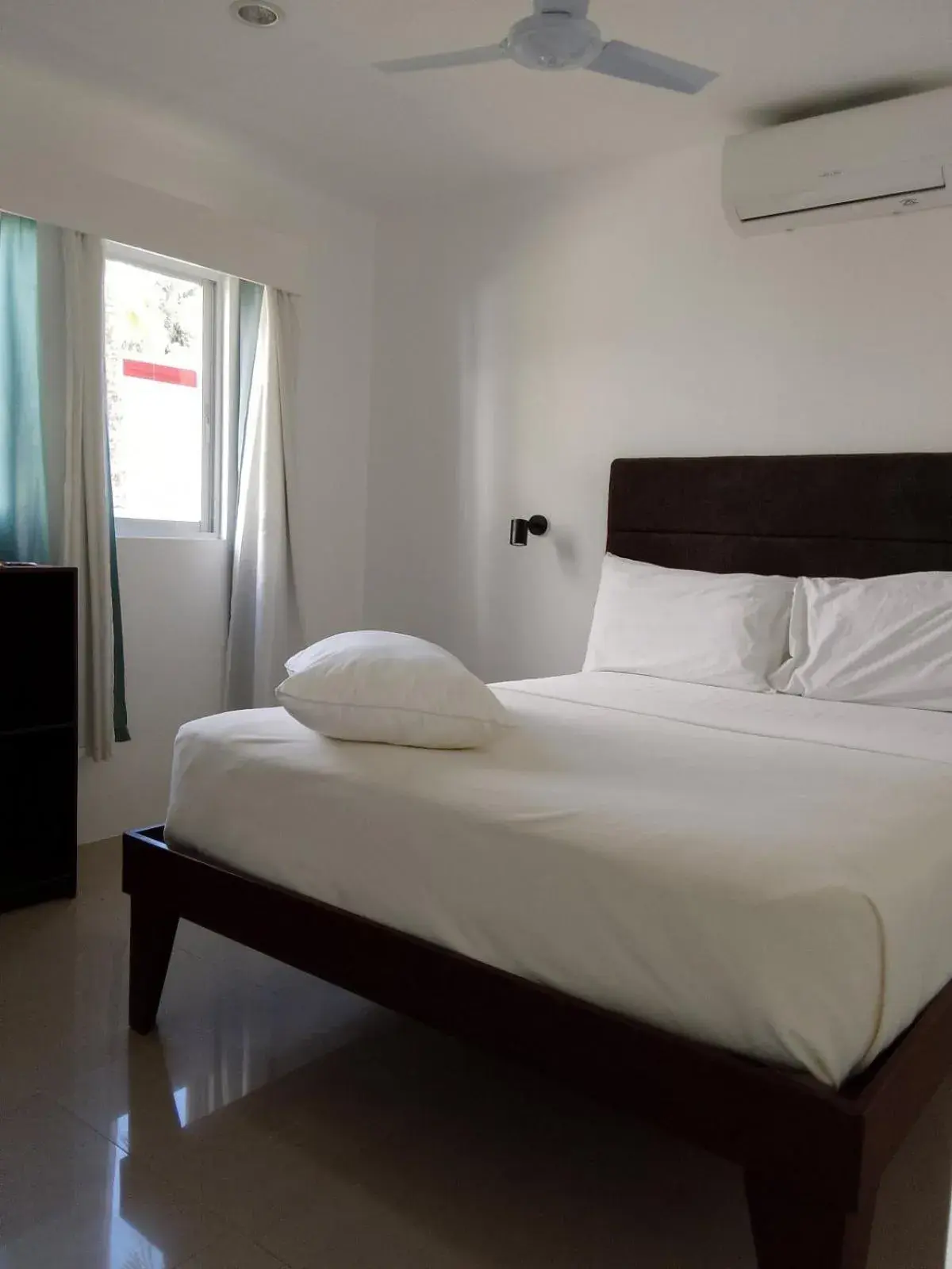 Bed in Heartland Hotel Serviced Rooms & Apartments. Bed in Heartland Hotel Serviced Rooms & Apartments.