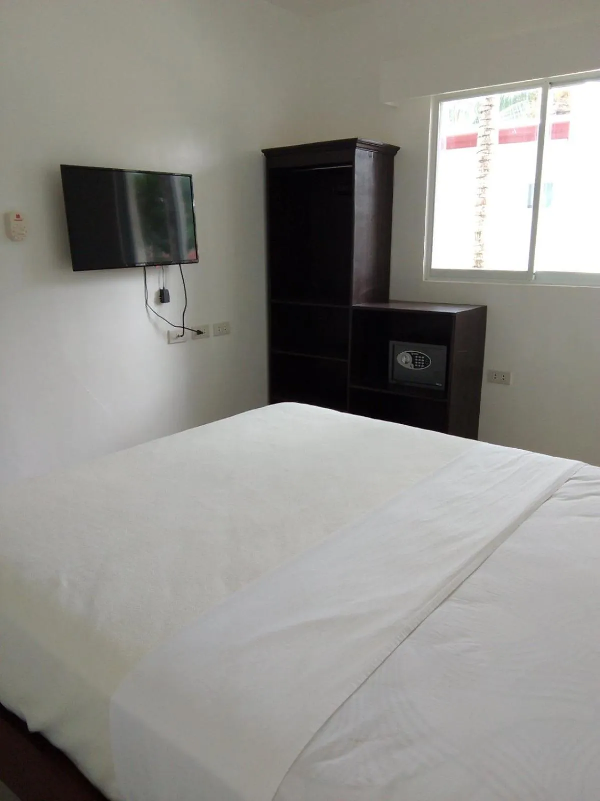 Bed in Heartland Hotel Serviced Rooms & Apartments.