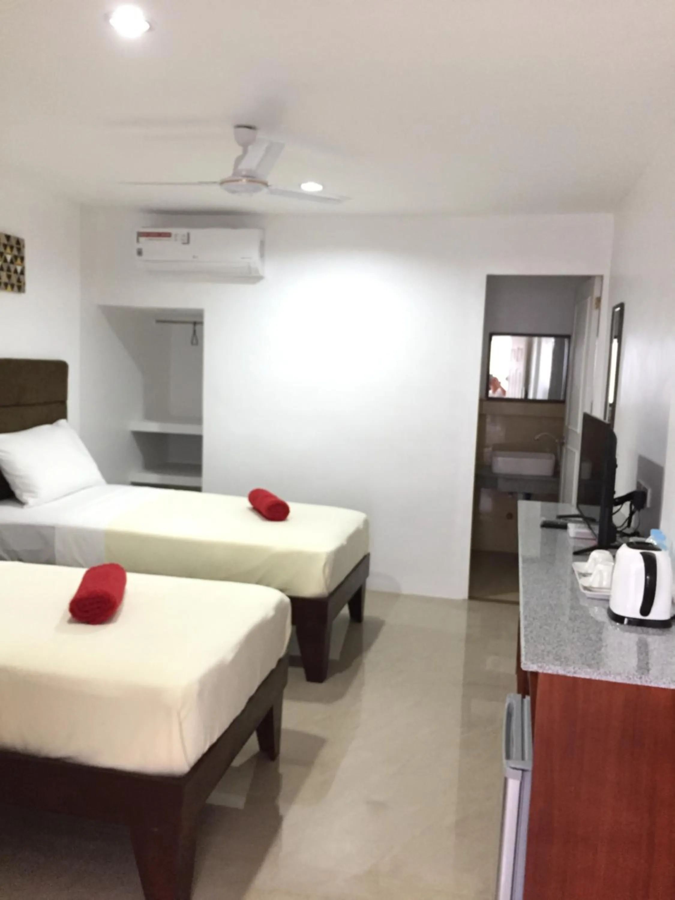 Bed in Heartland Hotel Serviced Rooms & Apartments.