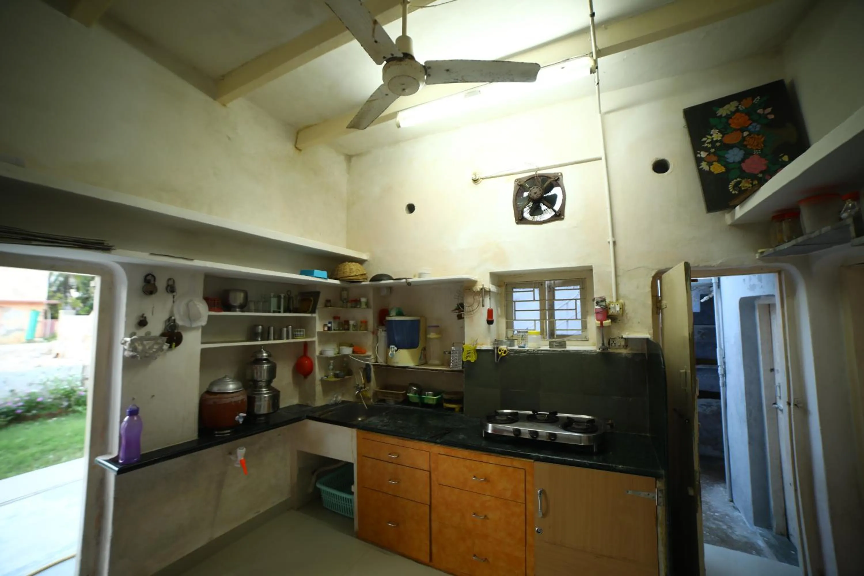Kitchen or kitchenette in Gurukrupa Bunglow