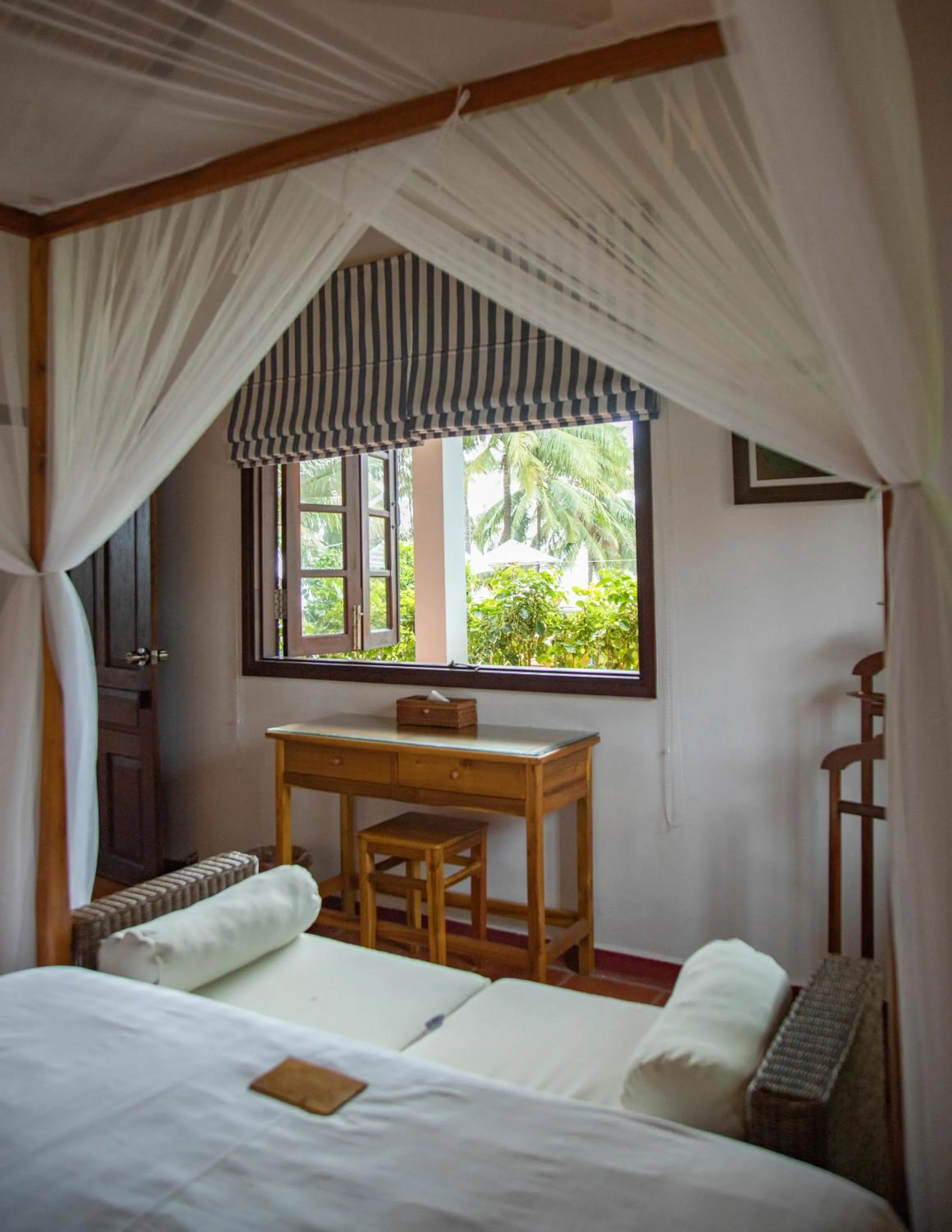 Bedroom, Bed in Cassia Cottage Resort and Spa