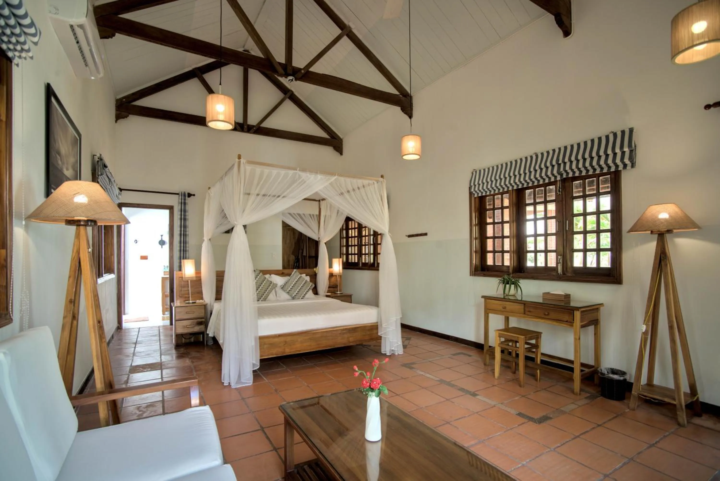 Bed in Cassia Cottage Resort and Spa