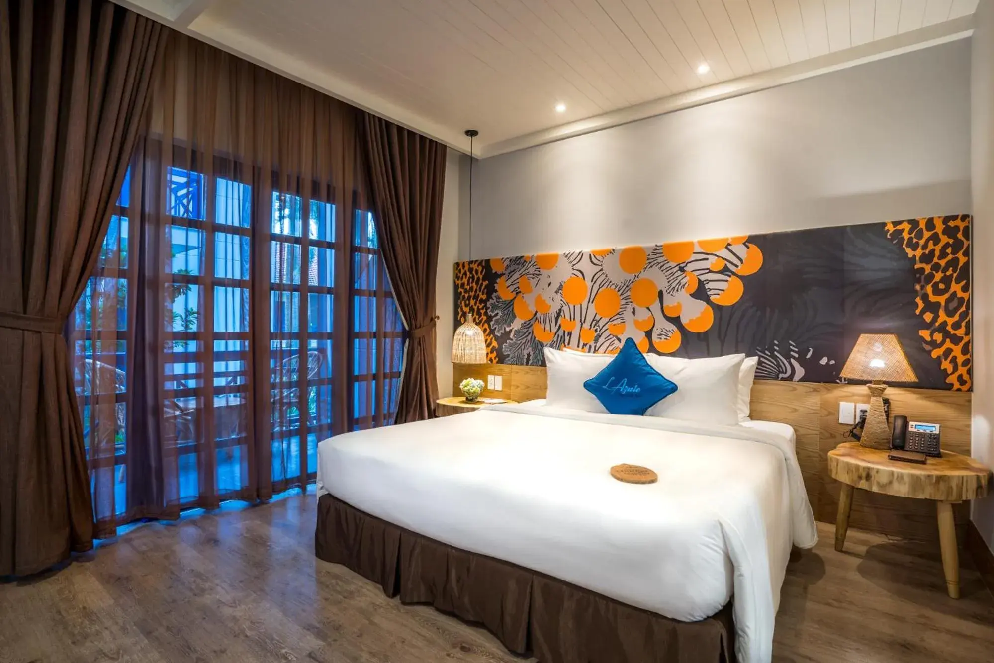 Bed in L'Azure Resort and Spa Bed in L'Azure Resort and Spa