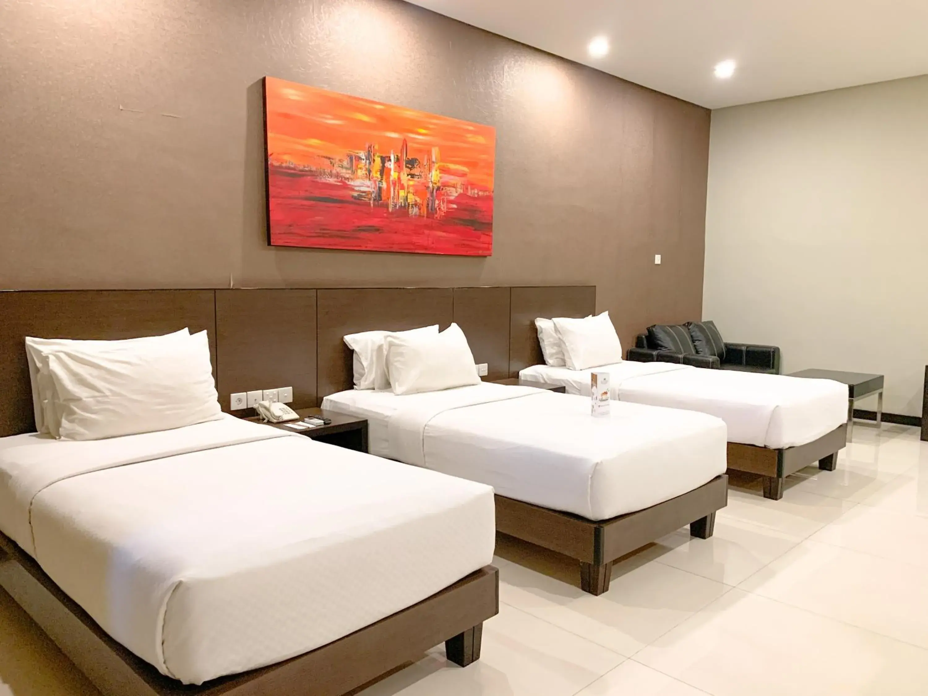 Triple Room in Savana Hotel & Convention Malang Triple Room in Savana Hotel & Convention Malang