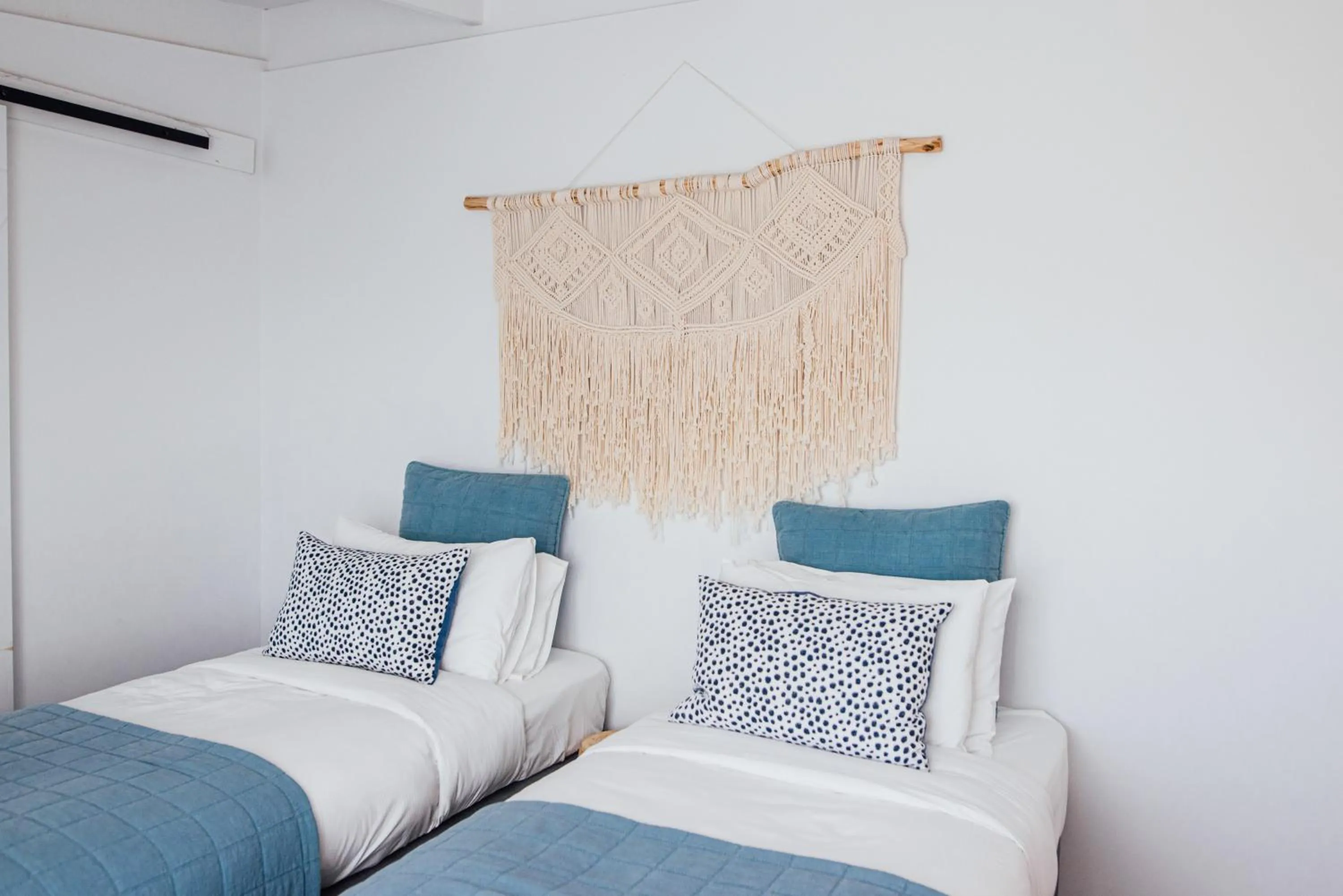 Bed in Port O' Call Motel