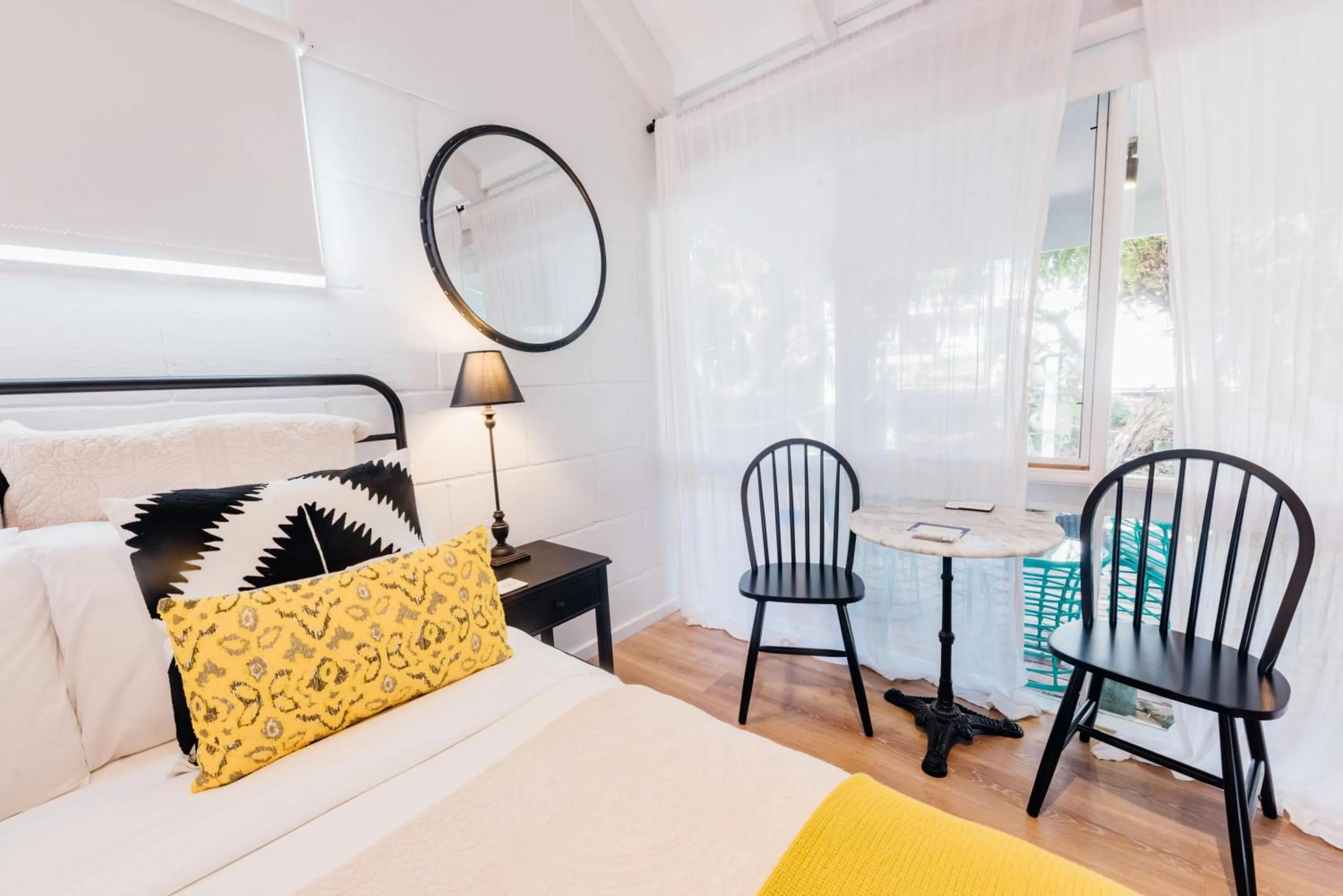 Bed in Port O' Call Motel