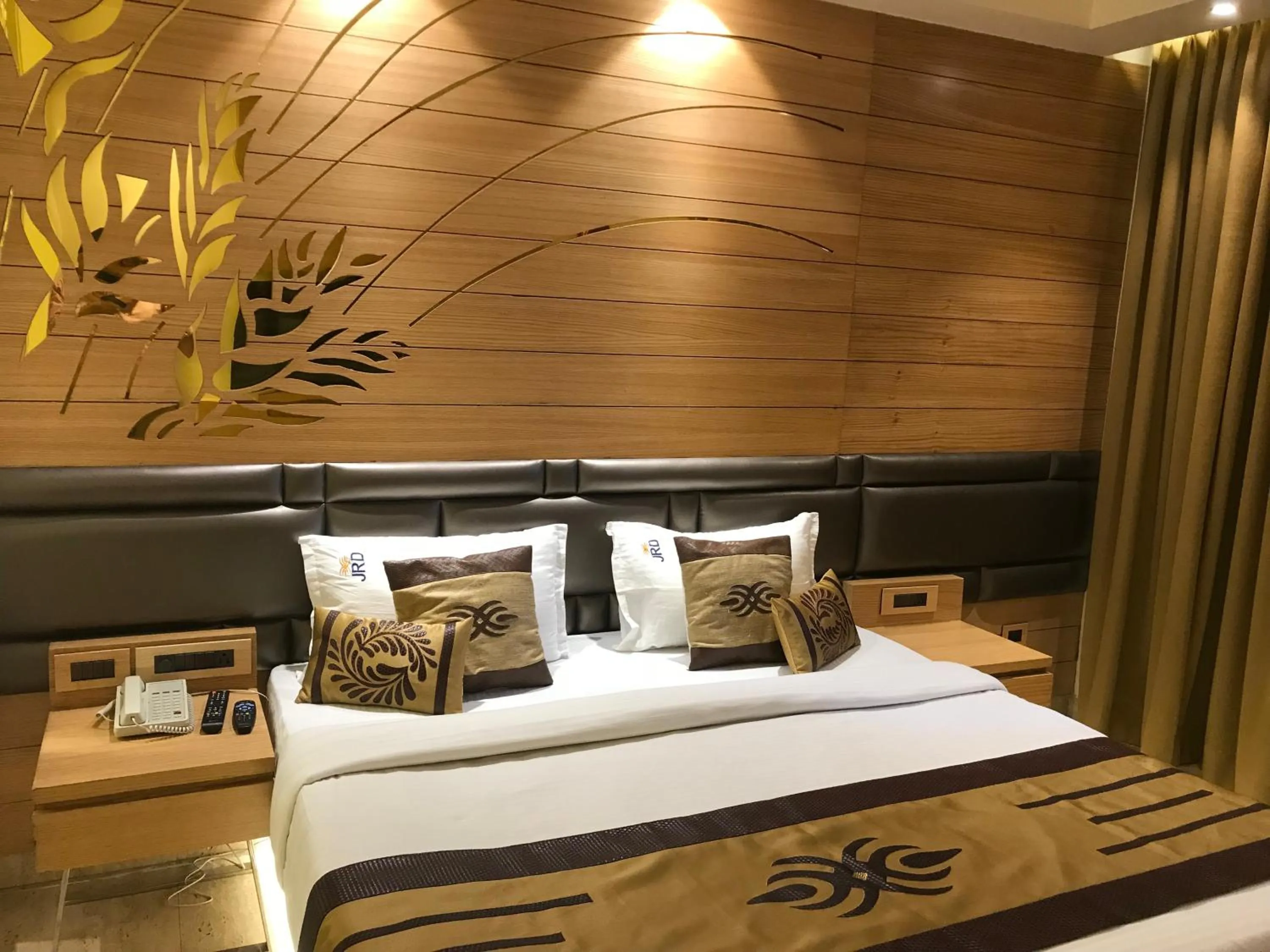 Bed in JRD Pride-Business Hotel
