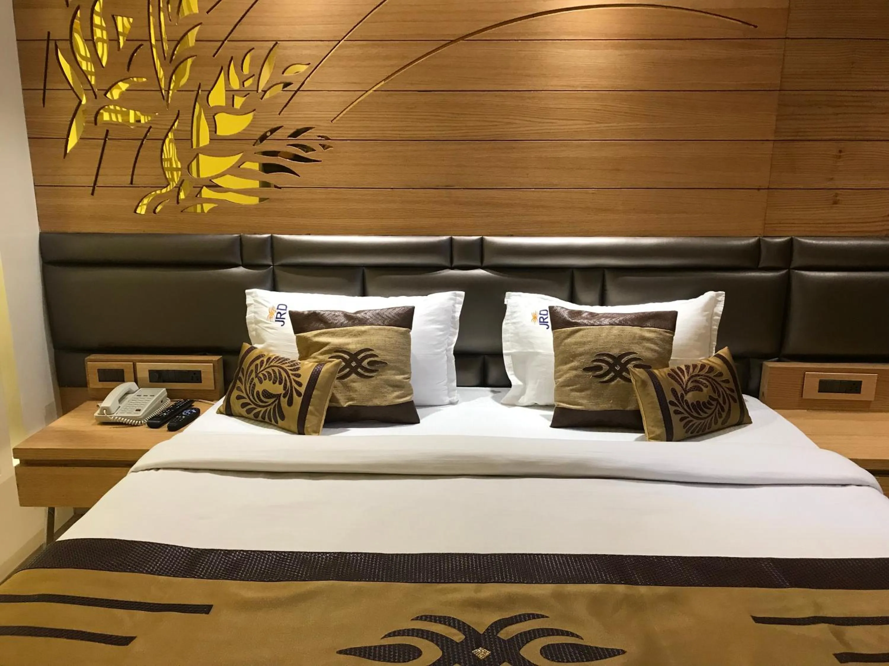Bed in JRD Pride-Business Hotel