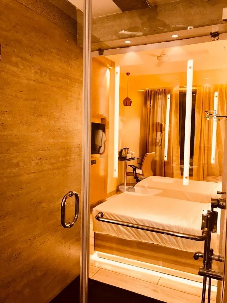 Bed in JRD Pride-Business Hotel