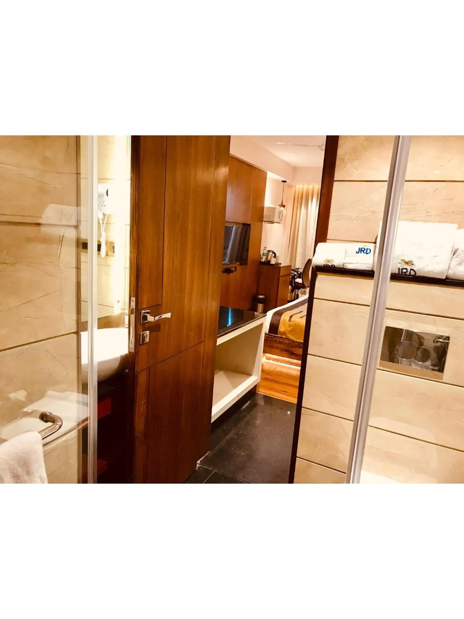 Bed in JRD Pride-Business Hotel